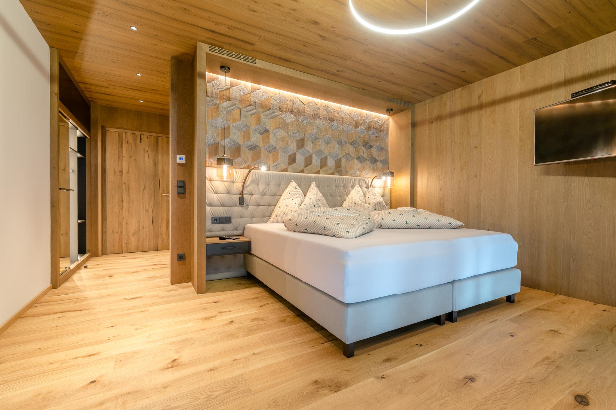 feratel-Die Kashütte - Zimmer Bett Fernseher