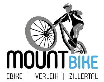 Das Bild zeigt ein Logo mit einem Mountainbiker, der auf einem Fahrrad in Action dargestellt ist – das Vorderrad hebt sich vom Boden. Der Text darunter lautet:  „MOUNTBIKE“ – wobei „MOUNT“ in Schwarz und „BIKE“ in Hellblau geschrieben ist. Darunter stehen