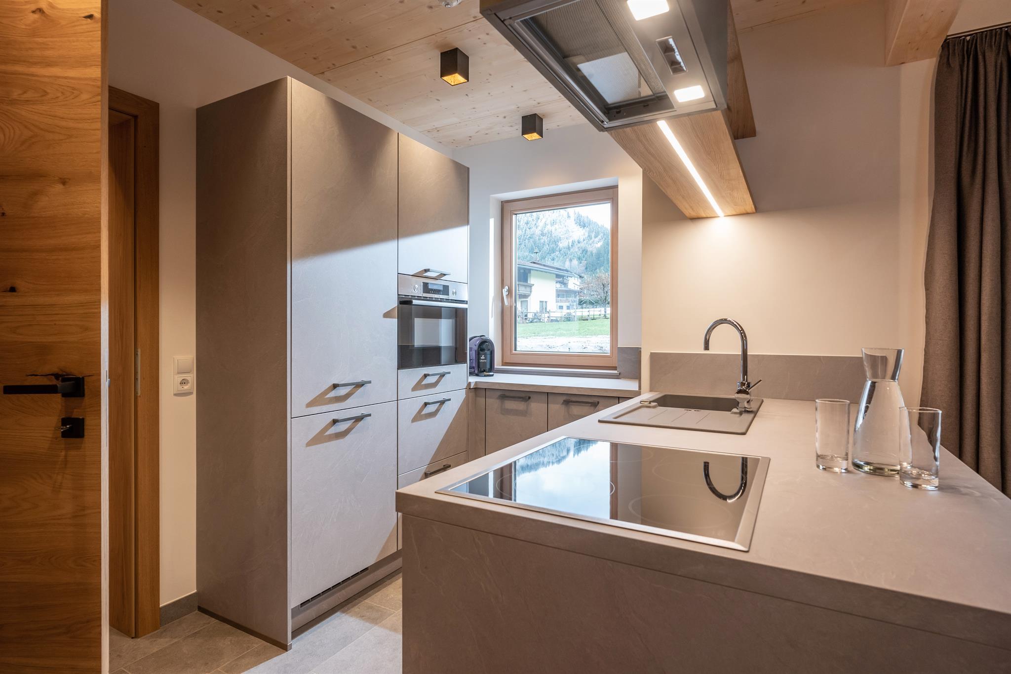 feratel-Griena Naturchalets - Griena_Naturchalets_Dorf_Haus_768b_Mayrhofen_Kuech