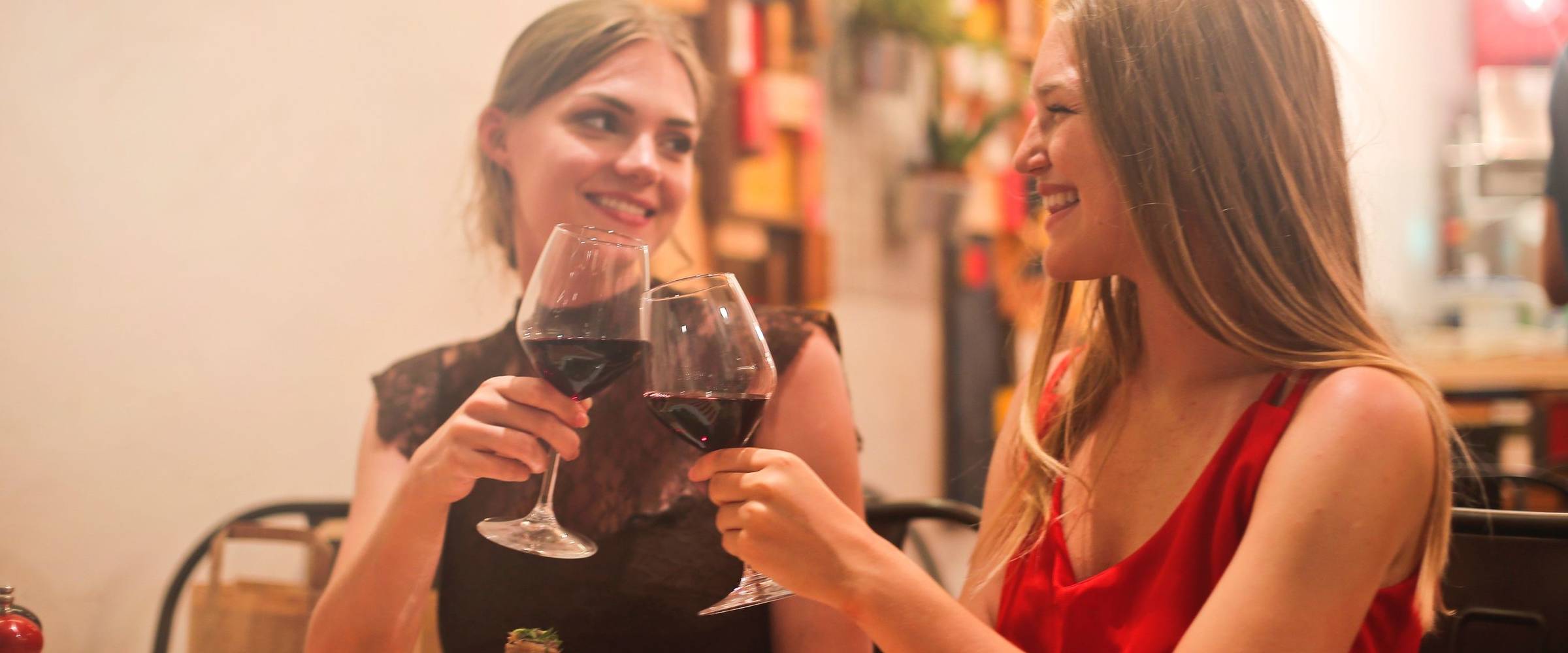 mys-Wein Rieser's Wine Tasting - bei dir Daheim oder in deinem Feriendomizil-Wein Rieser - Mayrhofen - two-women-holding-long-stem-wine-glasses-with-red-liquid-821054-7aab163c.jpg