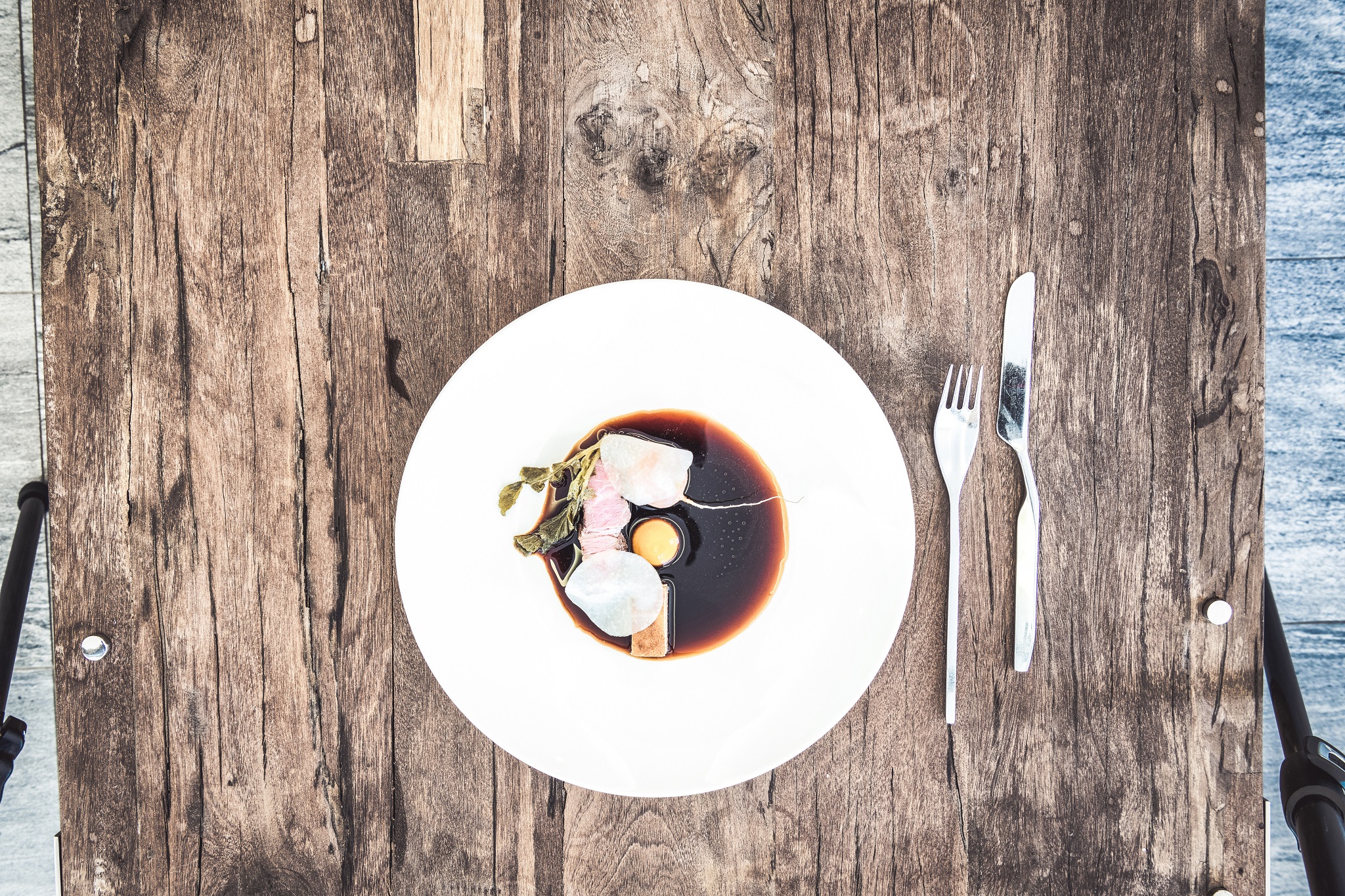 mys-Huber's Boutique Hotel-Huber Gastro GmbH & CO KG - Iberico Schweinenacken  Kartoffelbaumkuchen Karotte Radischen Kohlrabi.jpg