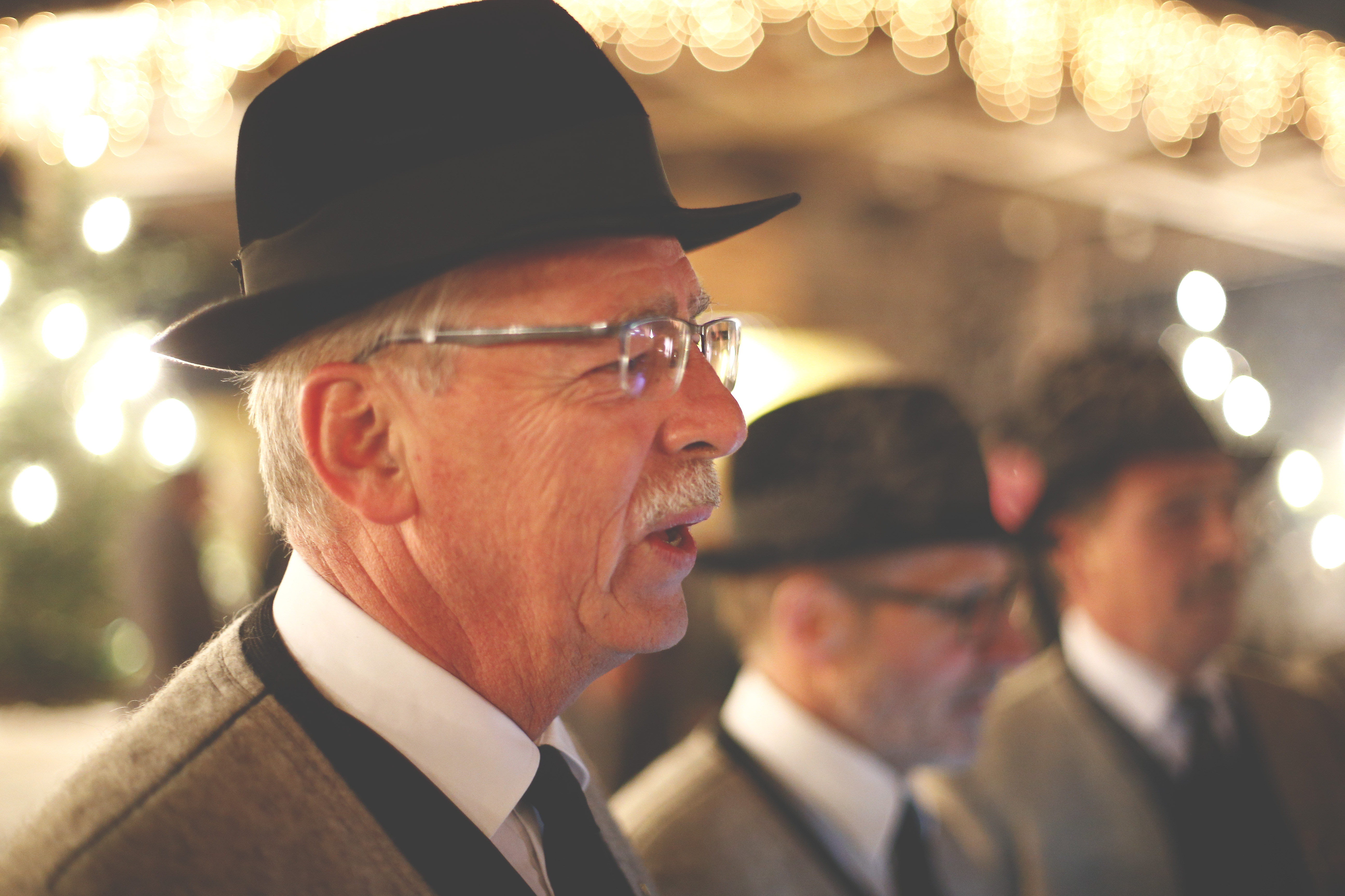 The picture shows the members of the Men’s Choir Association of Mayrhofen singing in their traditional costumes.
