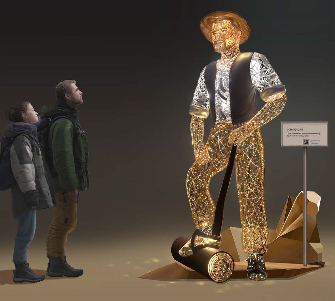 Riese Schwendau – beleuchtete Skulptur bei Nacht Beleuchtete Lichtskulptur in Schwendau (Tirol): stilisierte, überlebensgroße Figur mit leuchtenden Konturen und heller Kopfform steht auf abstrakter Basis; zwei Personen betrachten die Installation vor dunklem Himmel.