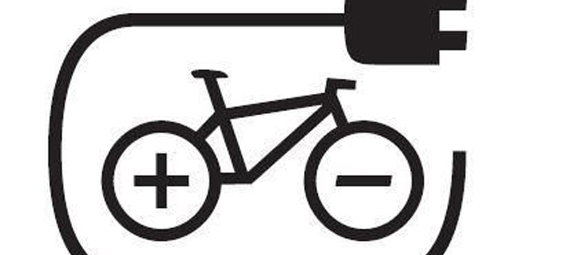 Icon of an e-bike connected to a power outlet with a charging cable.