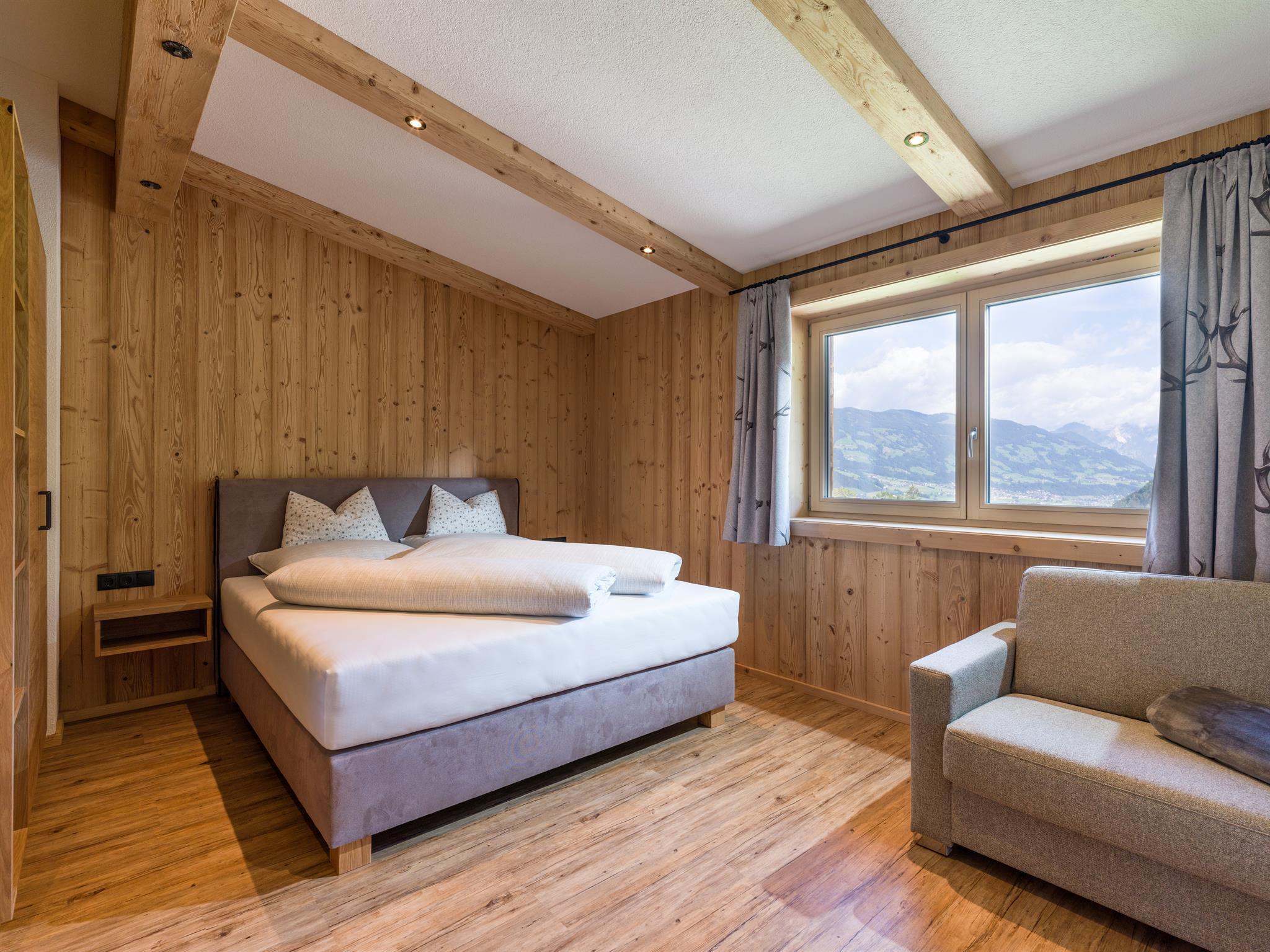 feratel-Boggnhof - Schlafzimmer mit Couch