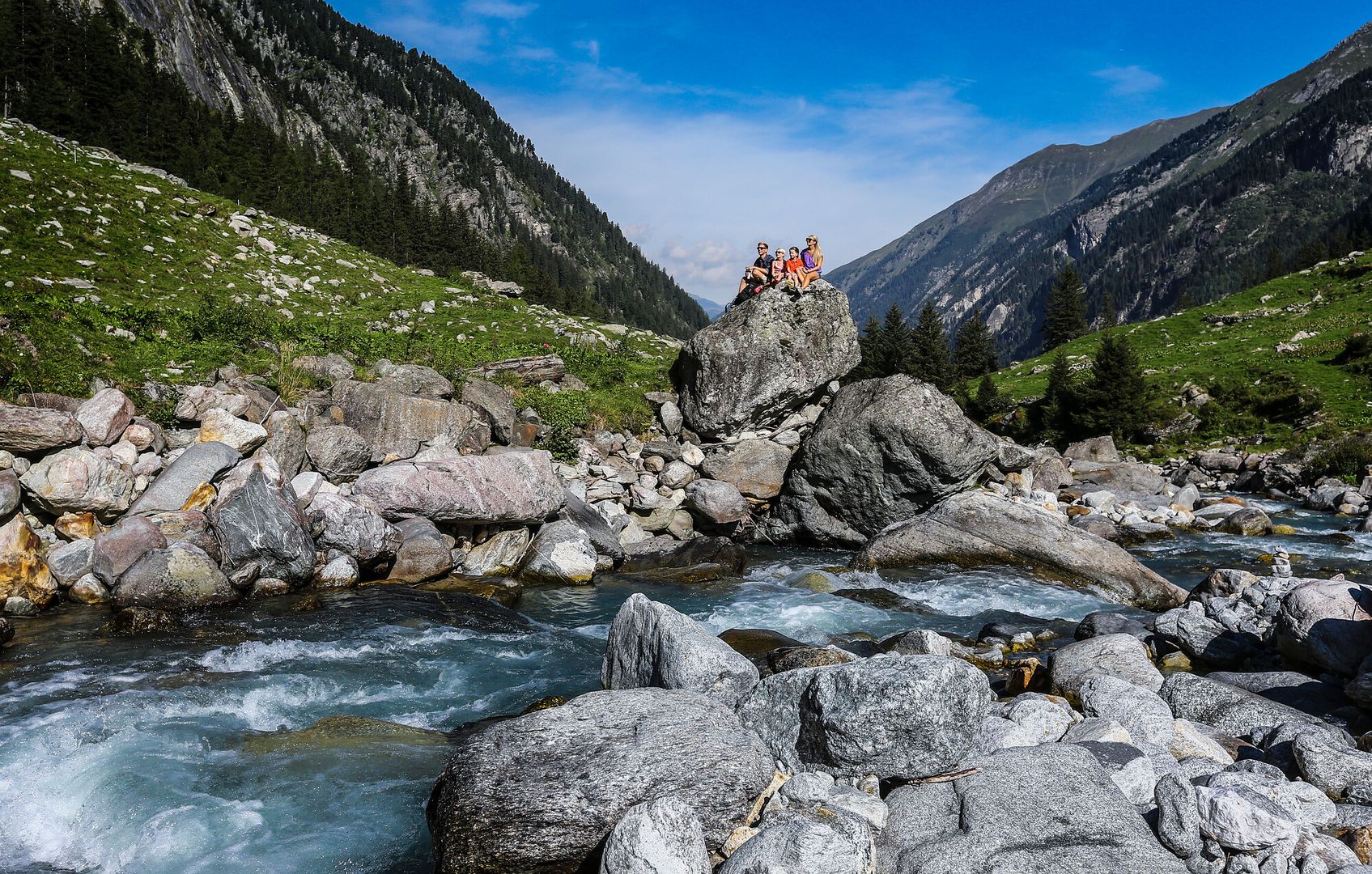 The family enjoys the mountain view in the Stilluptal Valley.