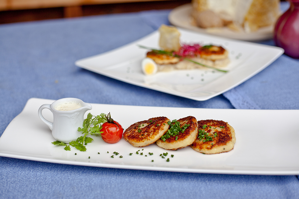 Zillertaler Pressknödel dein angerichetet auf einem Teller