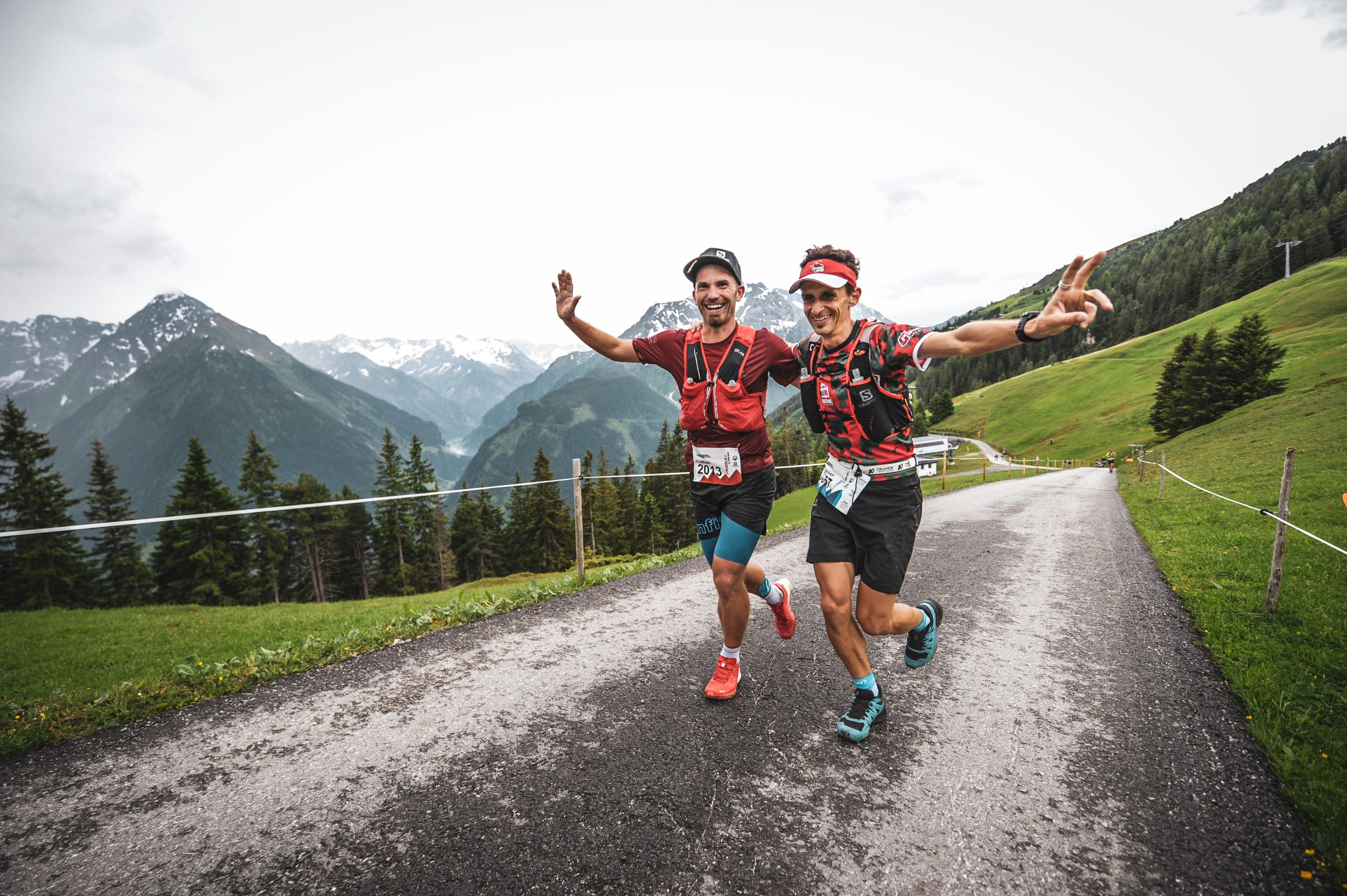The picture shows two runners running together.