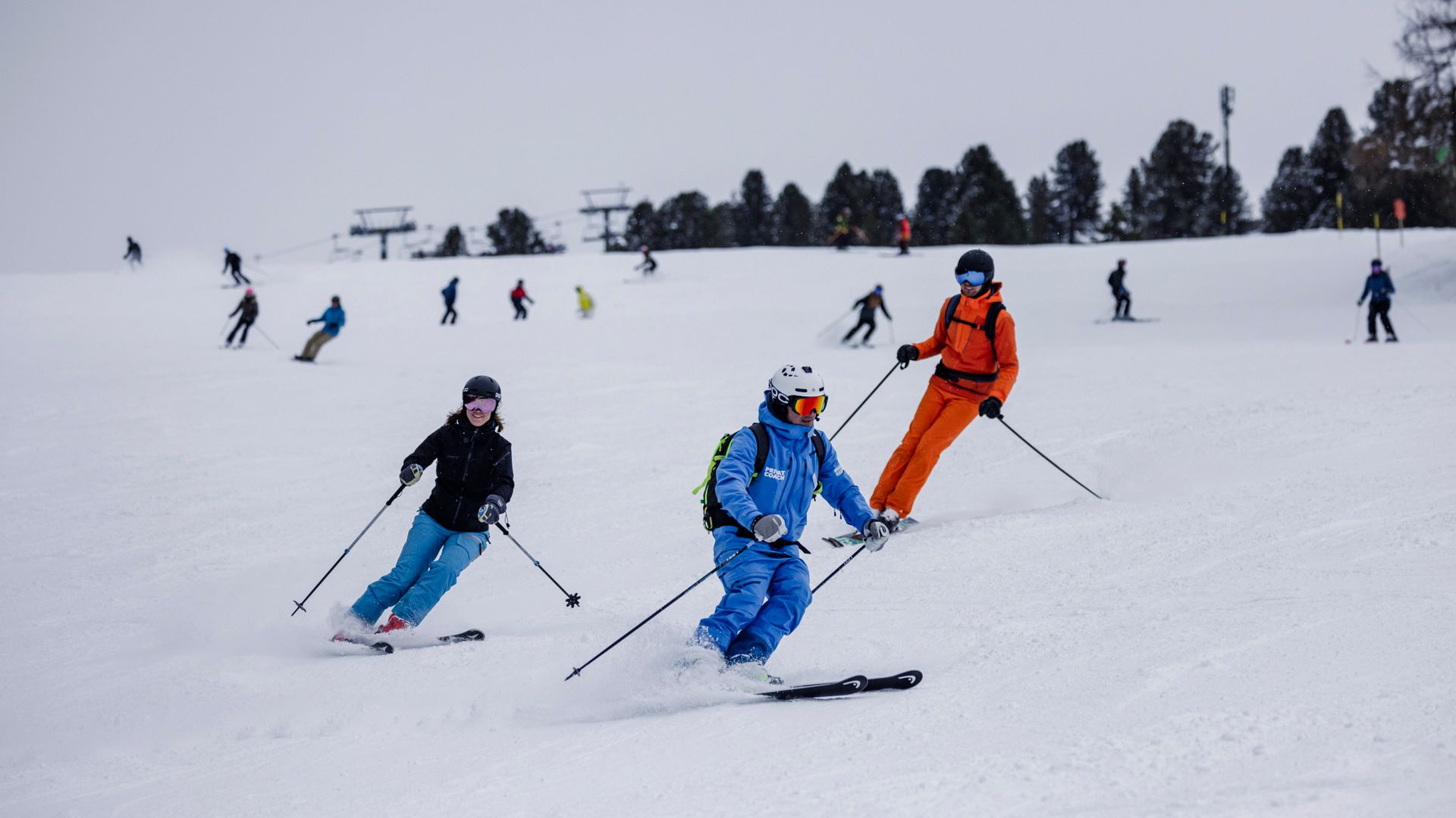 Ski instructor with students on the slopes in Mayrhofen