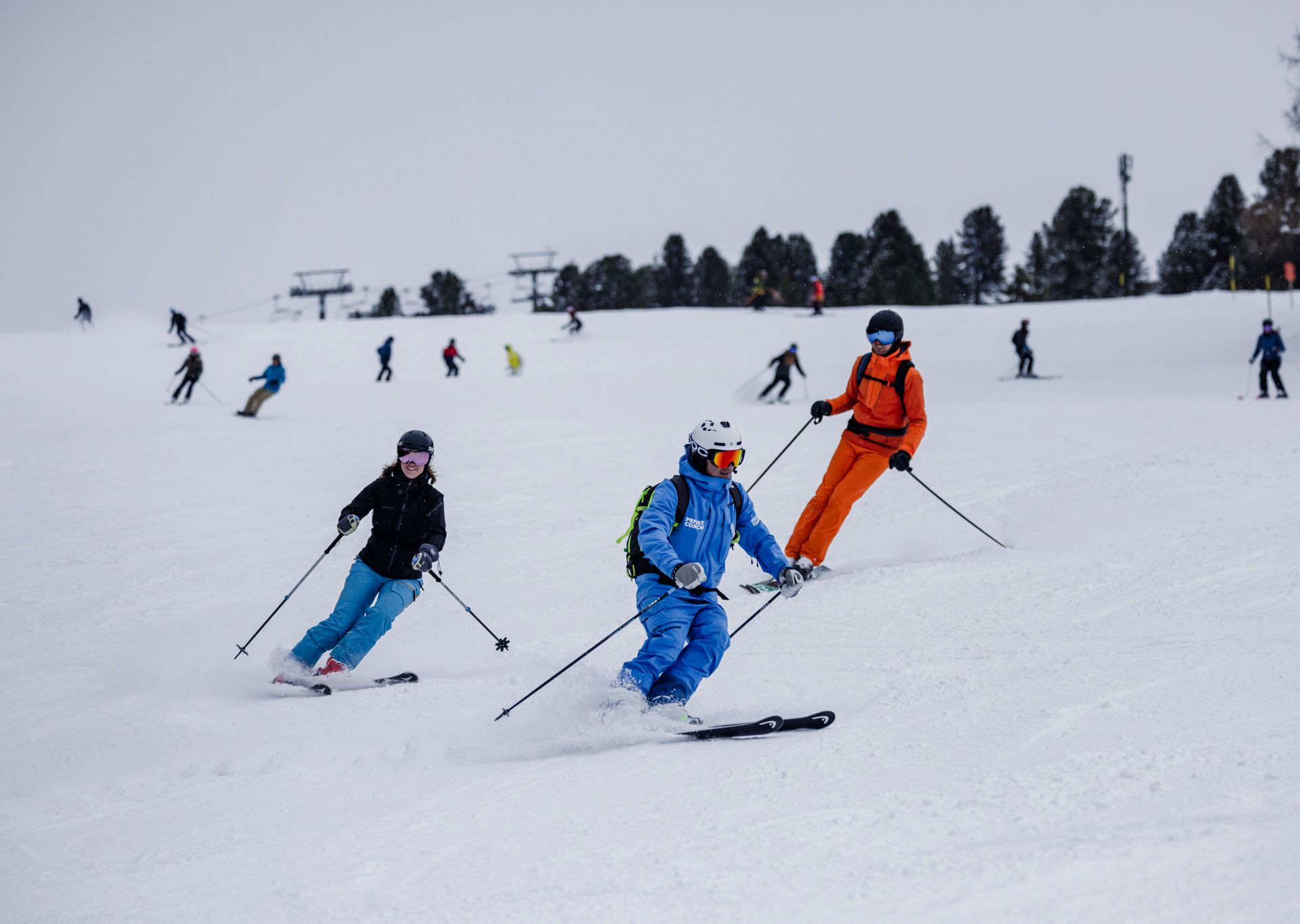 Ski instructor with students on the slopes in Mayrhofen