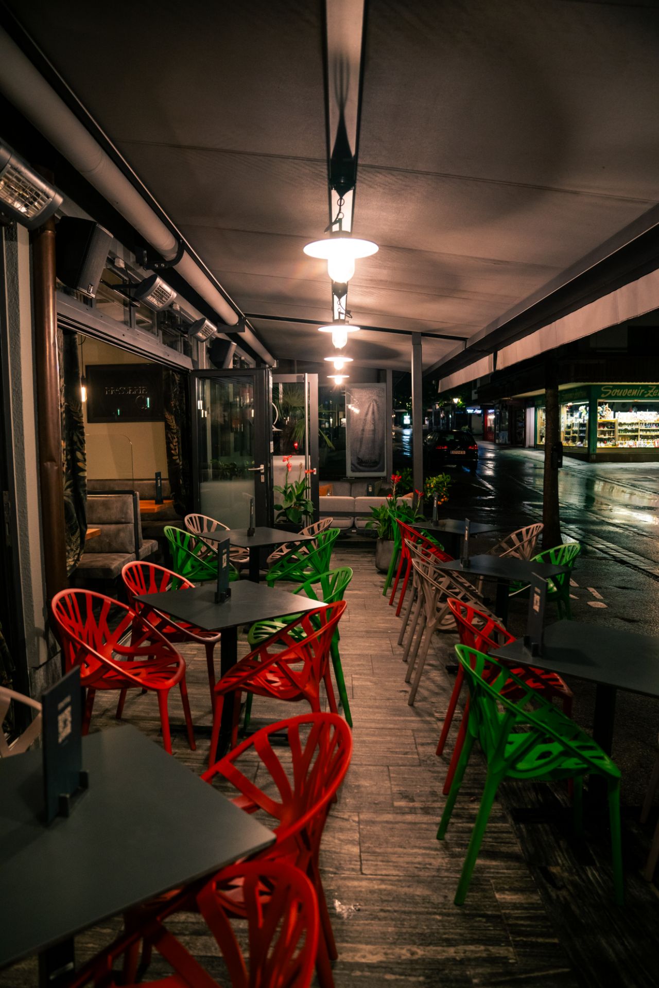 The logo of Brasserie Q features a white background with thin, elegant lettering. The “Q” is slightly larger and positioned below the main text, giving the design a stylish and contemporary touch.