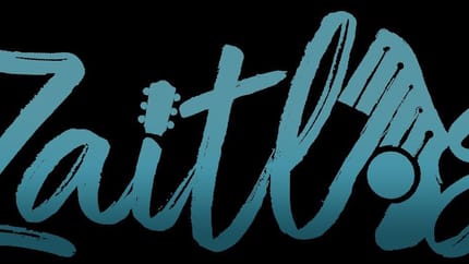 The picture shows the logo of the group Zaitlos in blue letters on a black background.