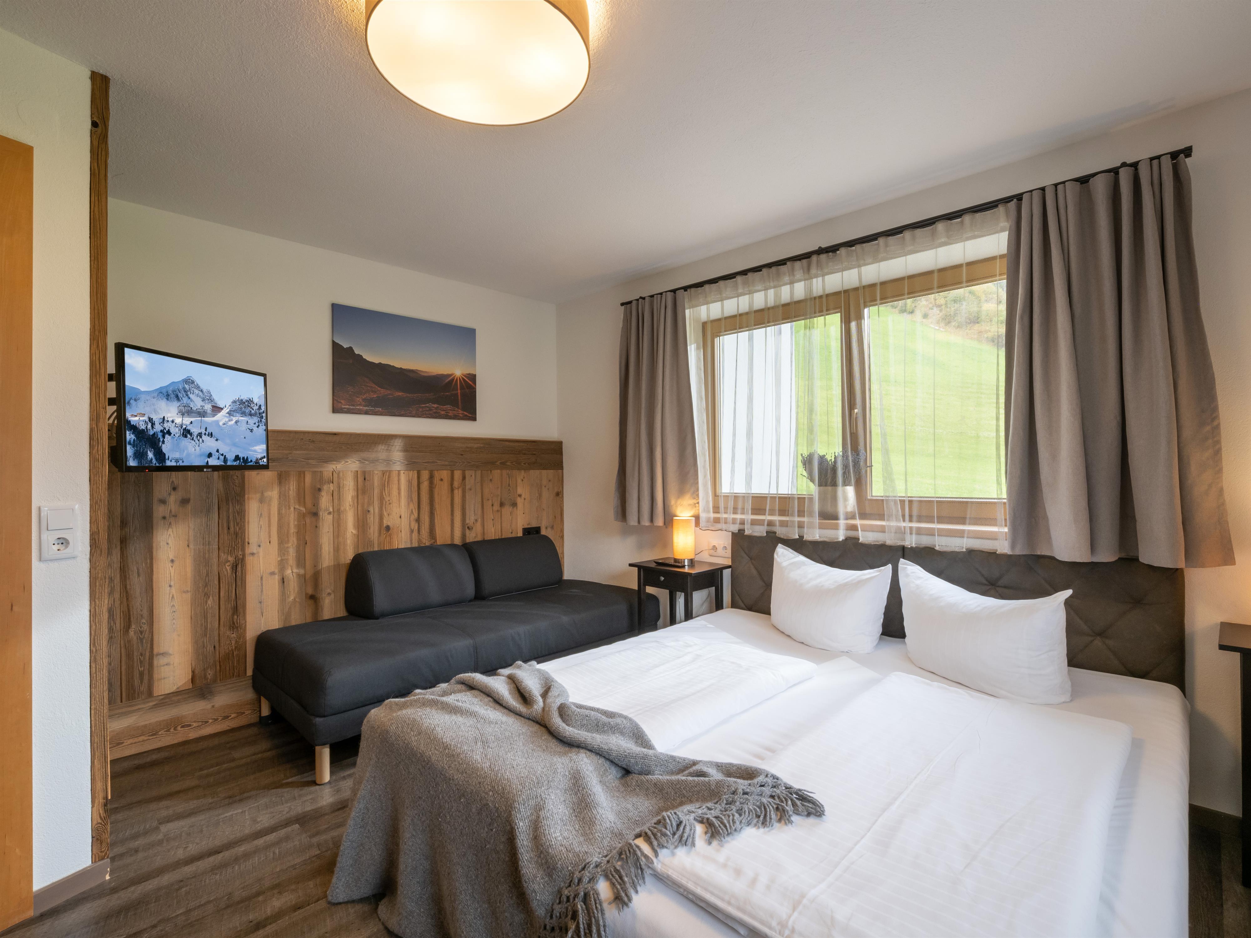 feratel-Zillertal Suites - Schlafzimmer Gartensuite