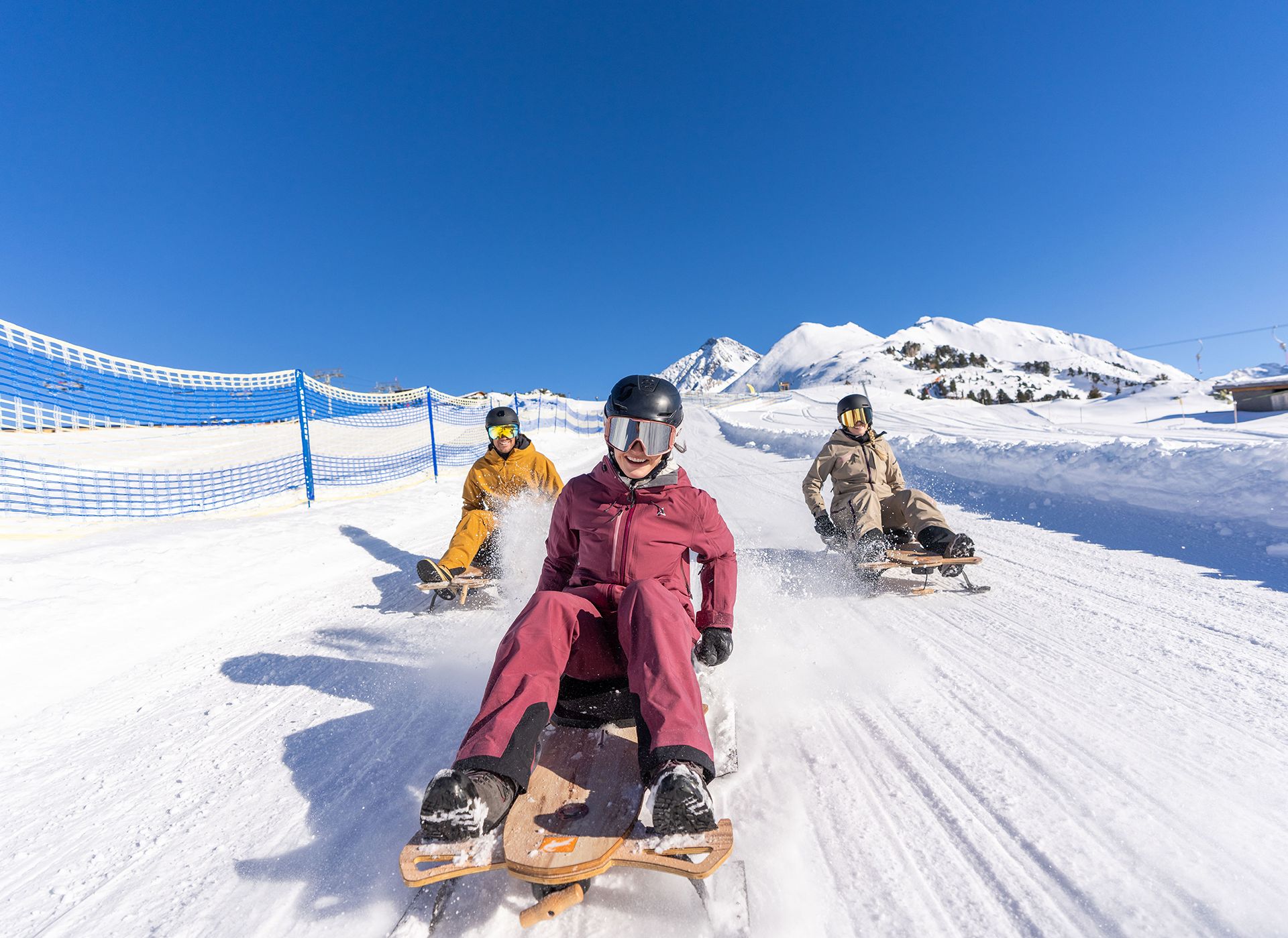 Friends riding the PistenBock at Mount Ahorn in Mayrhofen