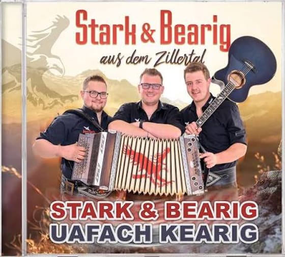 Three men with musical instruments, including an accordion, standing in front of a backdrop with 'Stark & Bärig' text.