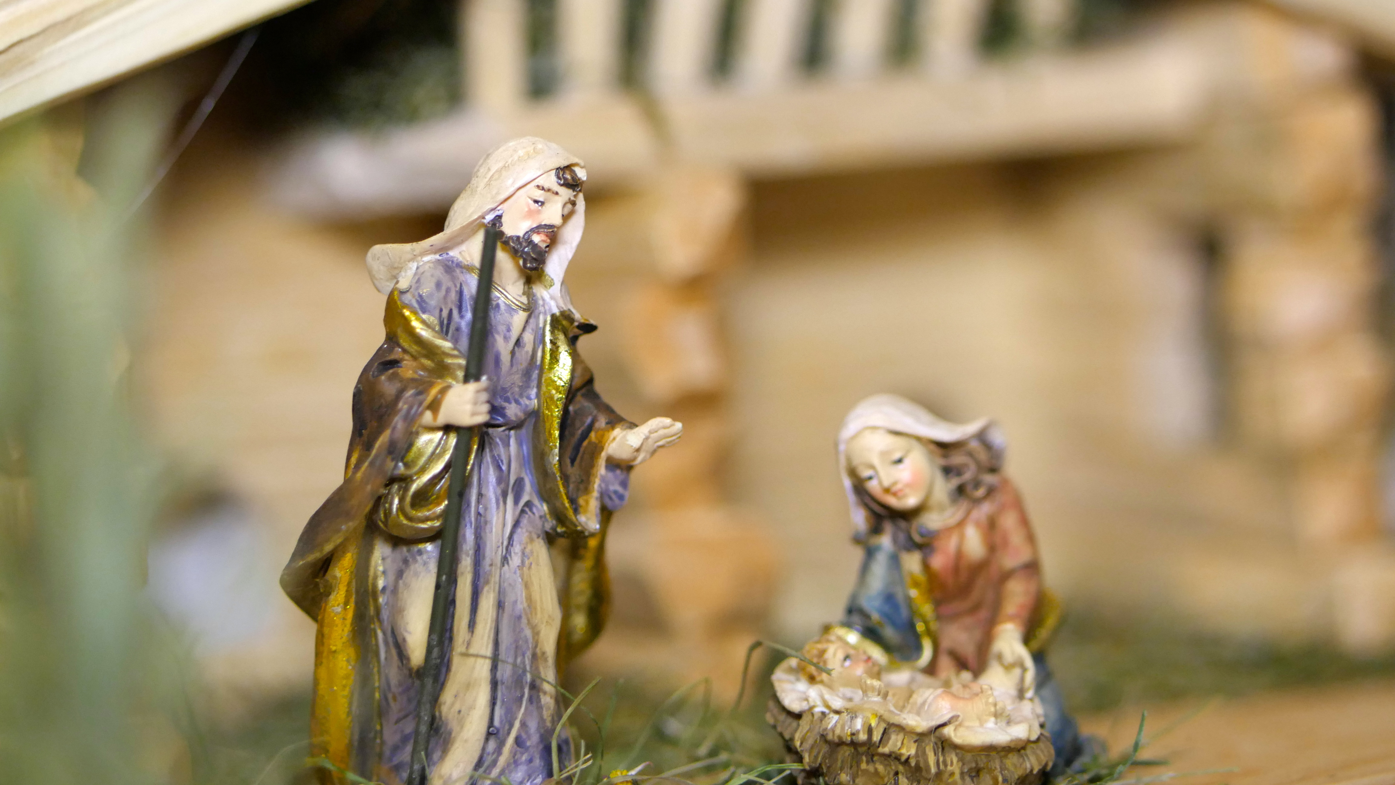 Detailed nativity scene with Jesus, Mary, and Joseph, colorful and handcrafted.
