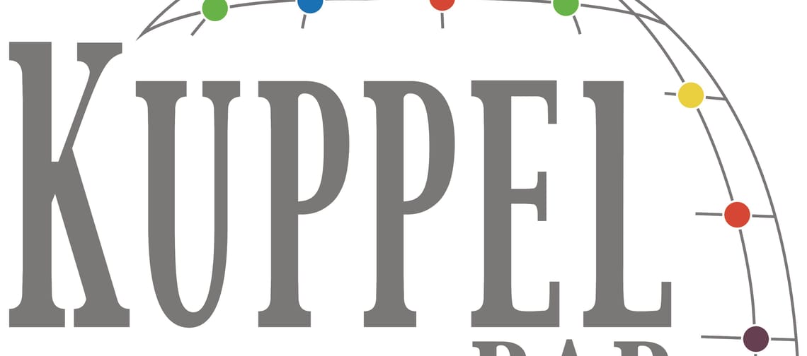 Auf dem Bild kann man das Logo der Kuppelbar mit beleuchteten Kugeln sehen