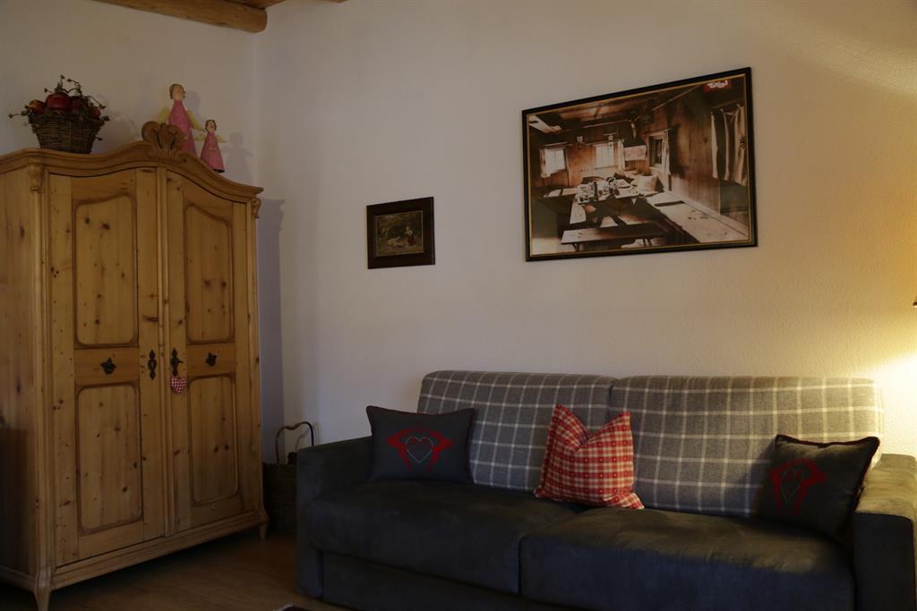 feratel-Ferienwohnung Angerer - Wohnzimmer mit Komfotcouch