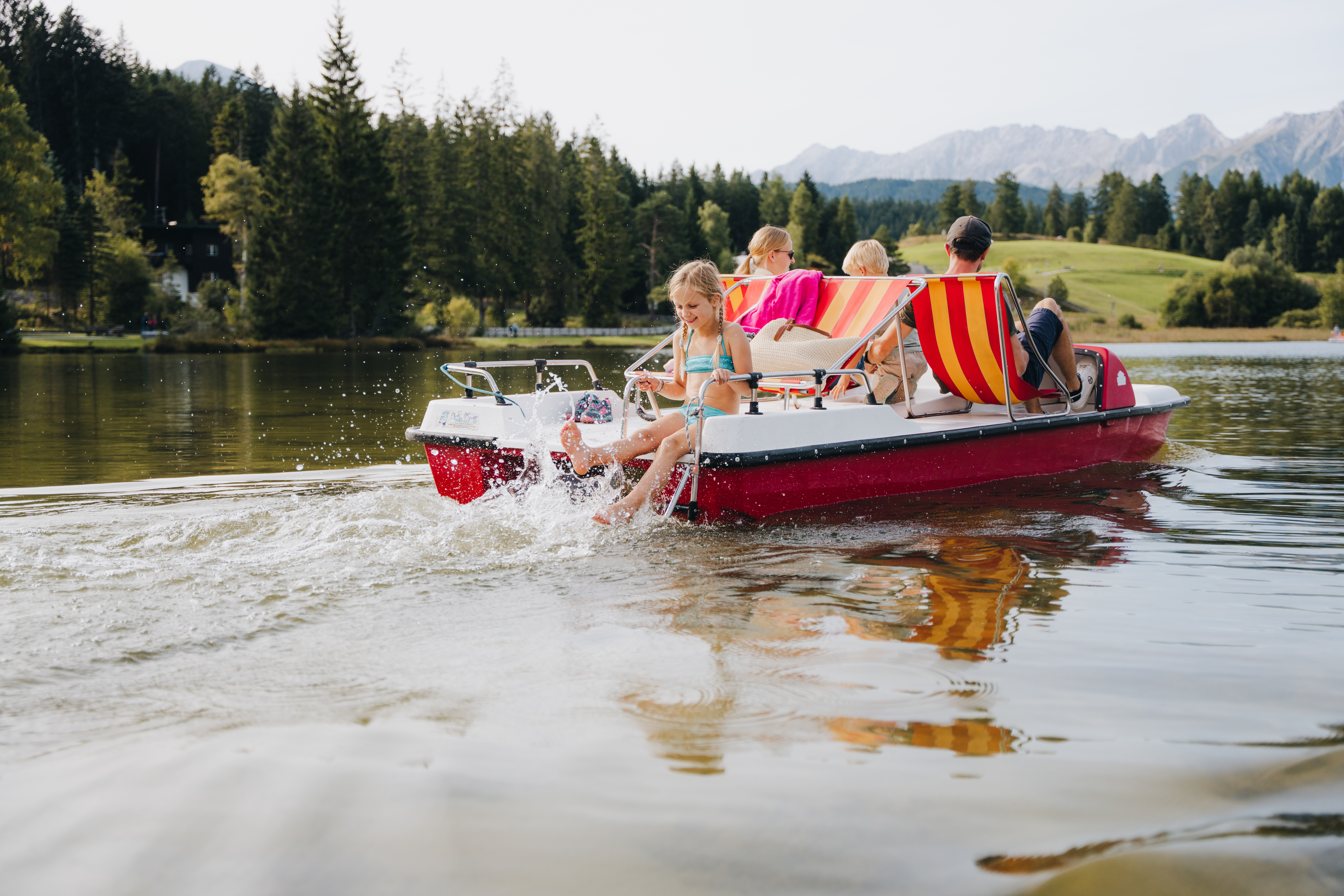 Family vacation in the Seefeld region - pedal boating on the Wildsee in Seefeld