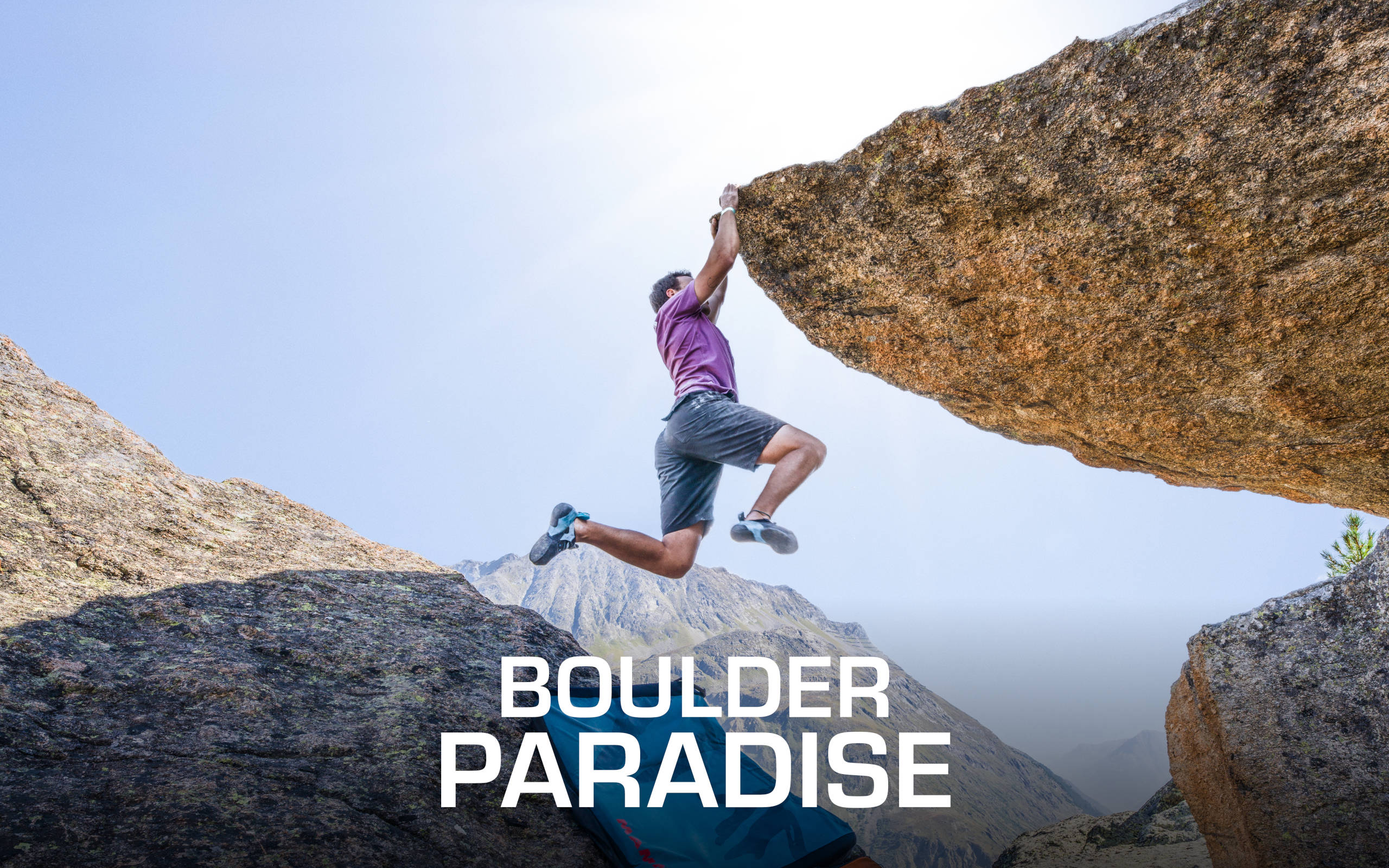 Climber over a cliff
