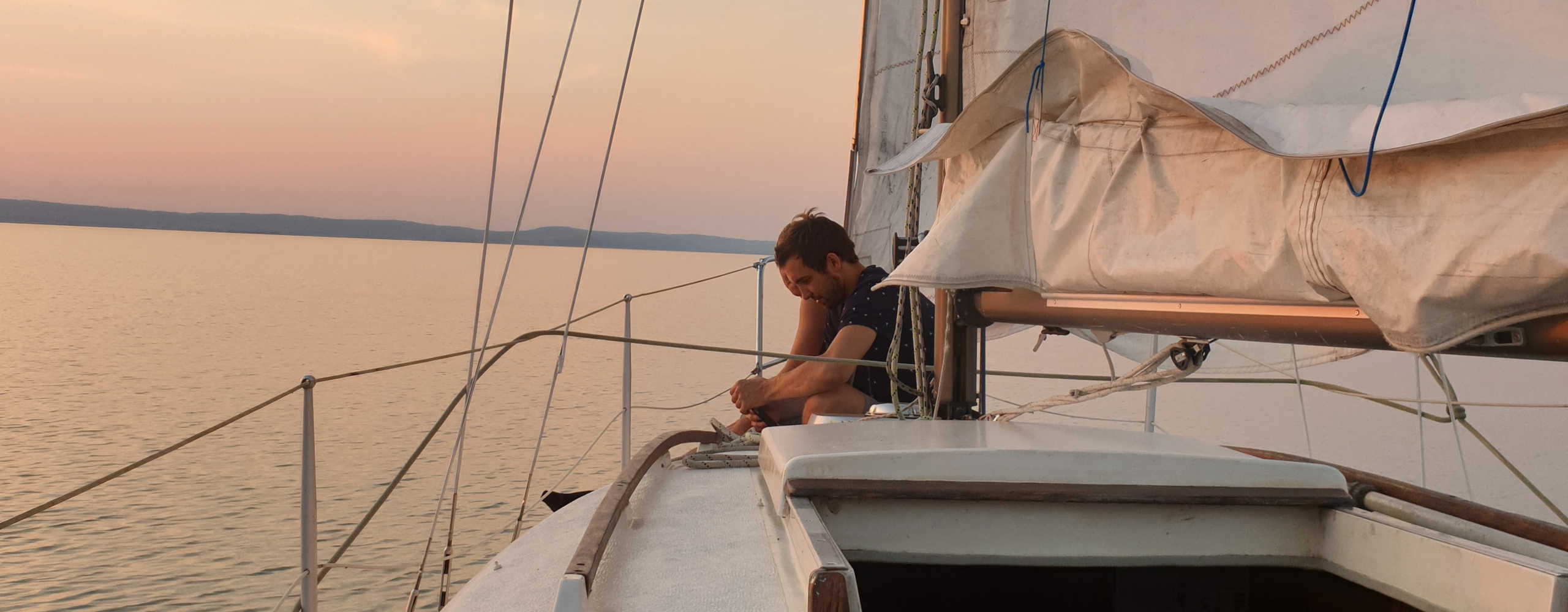 Sunset on a Sailboat