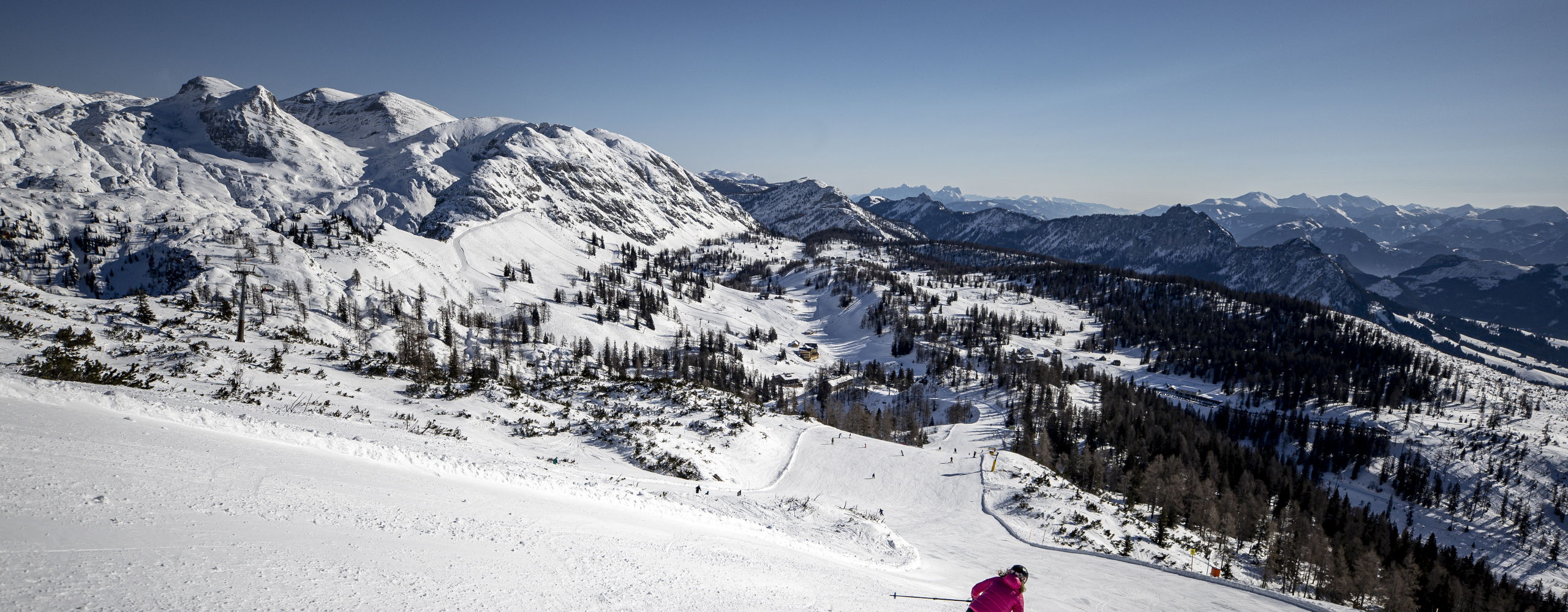 Skier on a groomed slope
