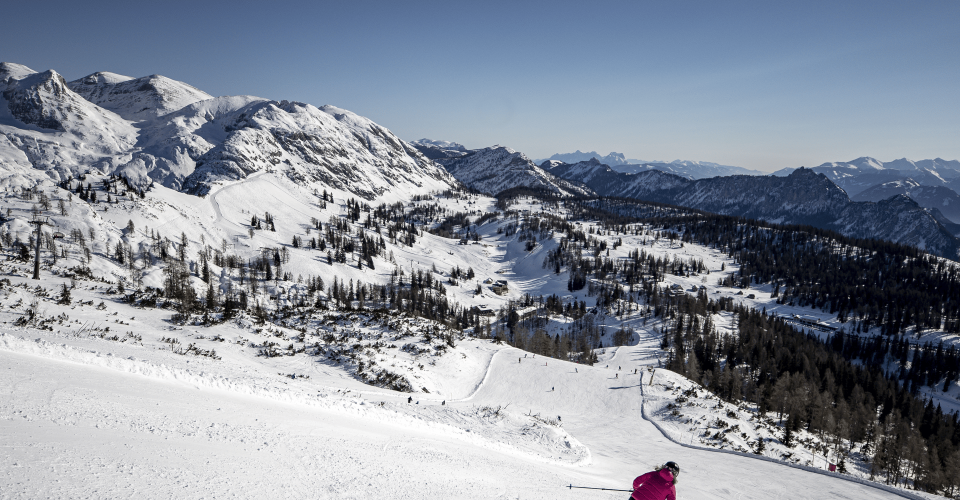 Skier on a groomed slope