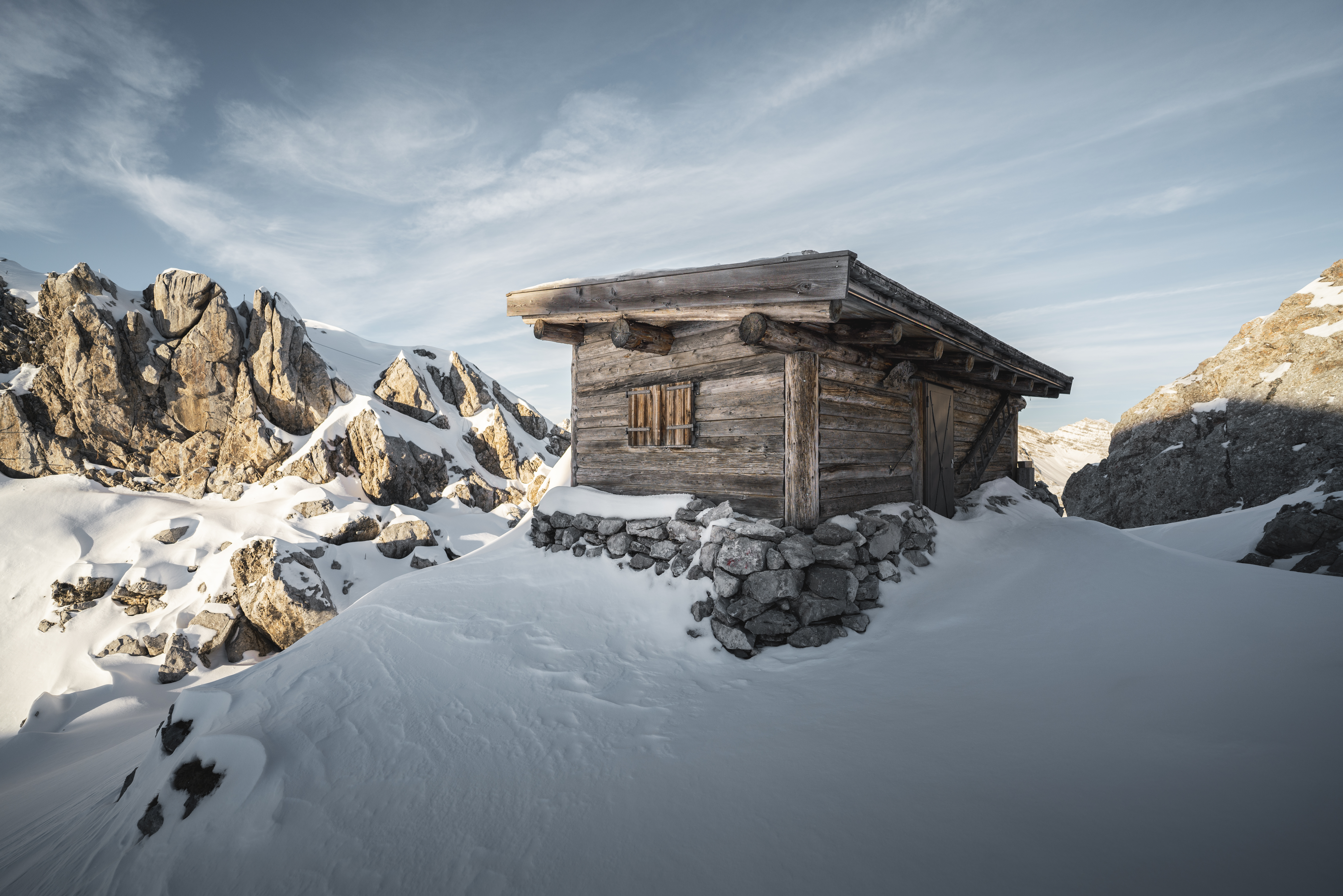 Alpine hut in the Alps winter