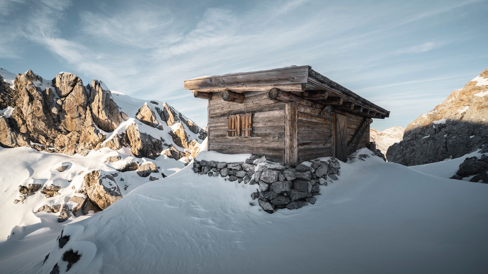 Alpine hut in the Alps winter