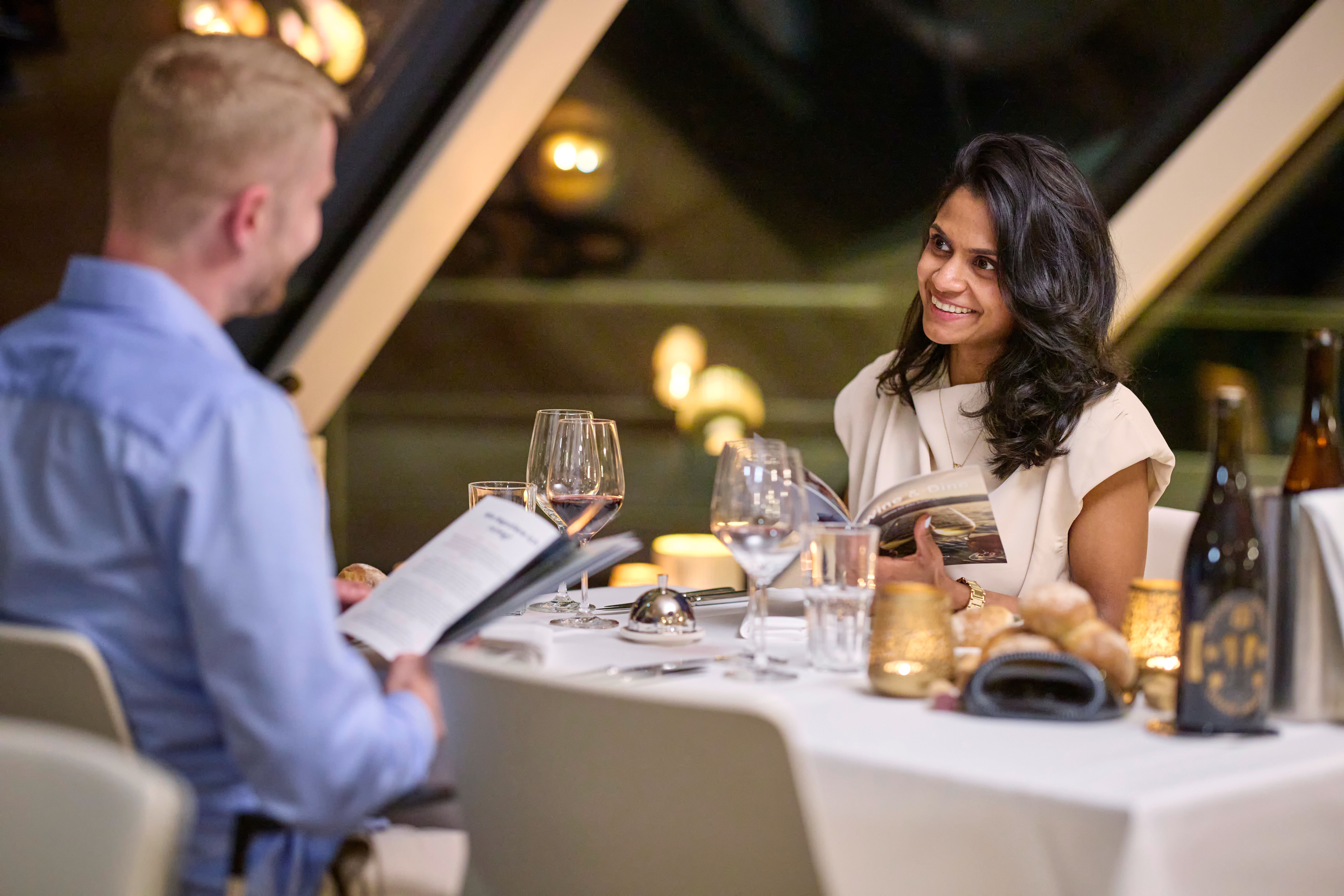 Candlelight dinner for two with a delicious meal and a romantic atmosphere.