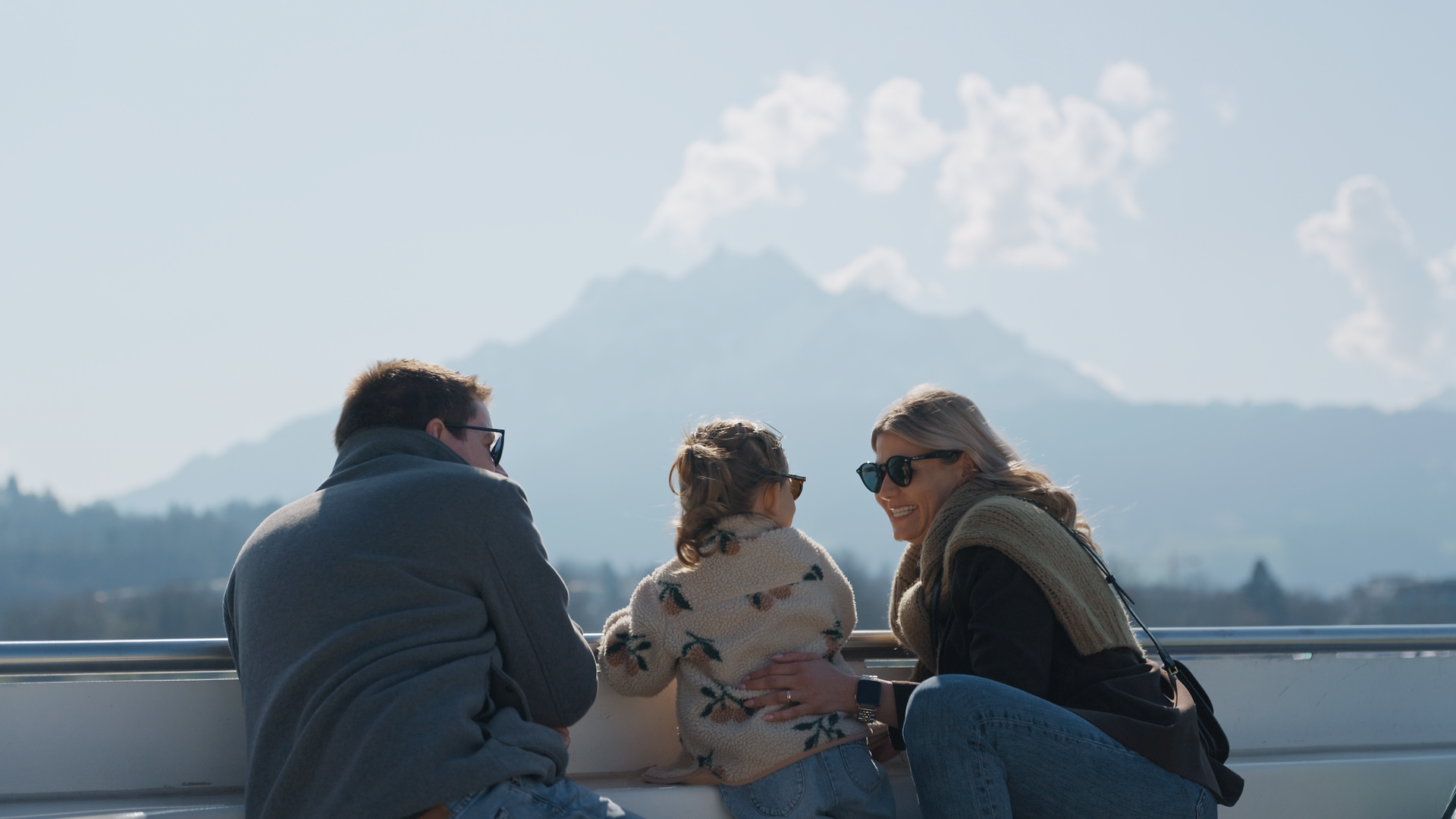 Family enjoying the view on board the motor vessel Diamant during a Mother's Day cruise on Lake Lucerne
