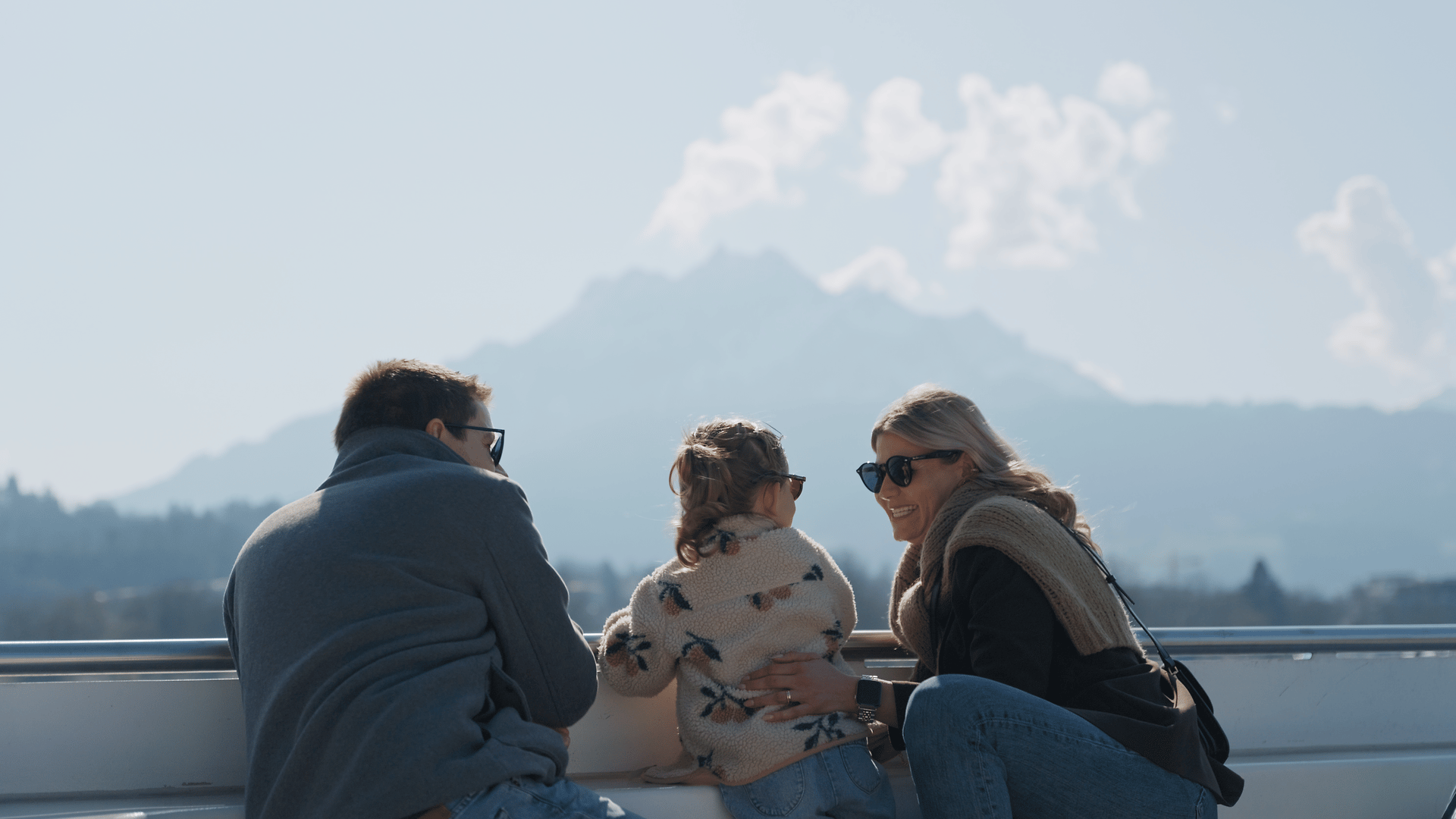 Family enjoying the view on board the motor vessel Diamant during a Mother's Day cruise on Lake Lucerne