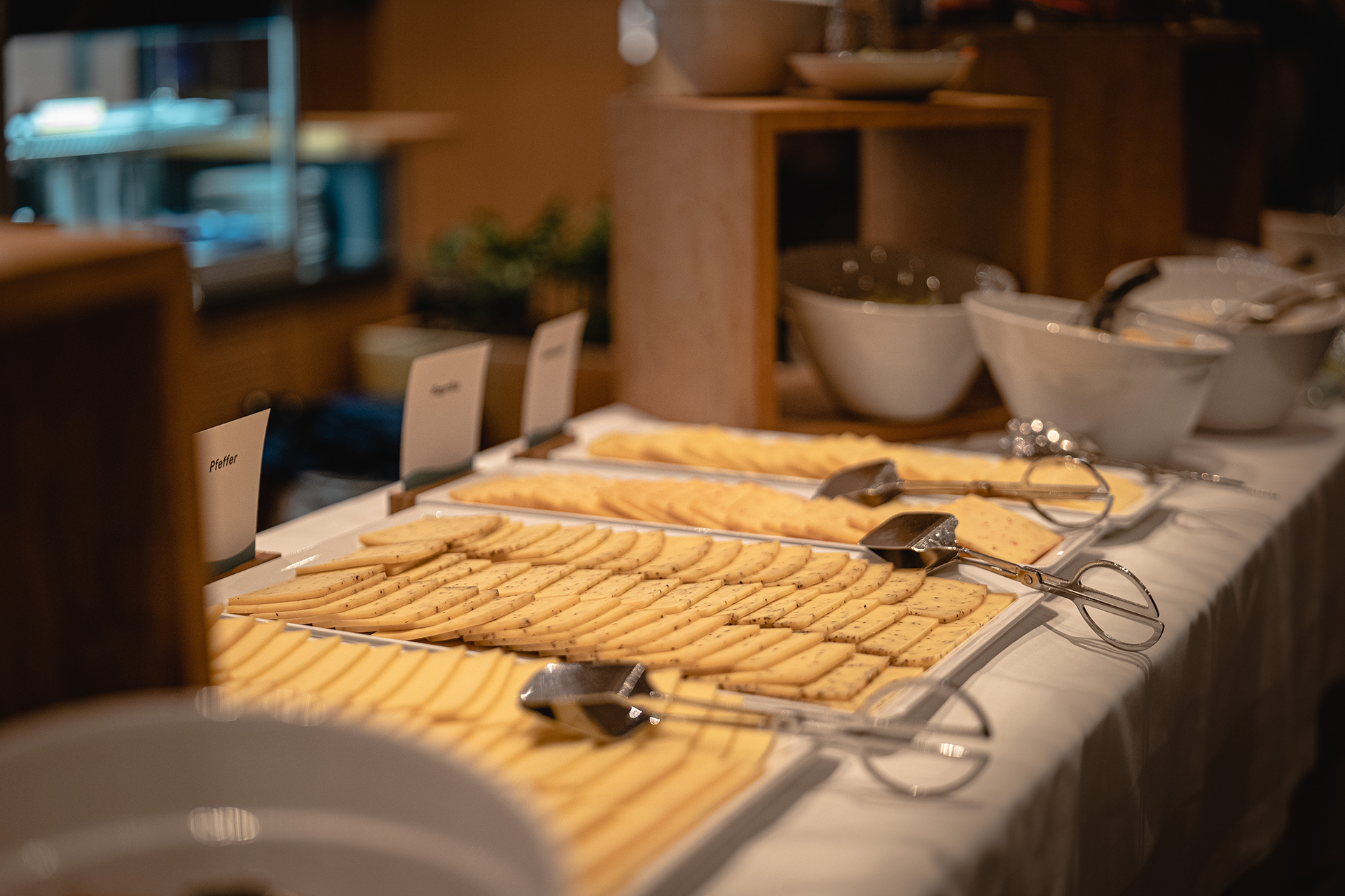 The picture shows a table laid with a fondue set.