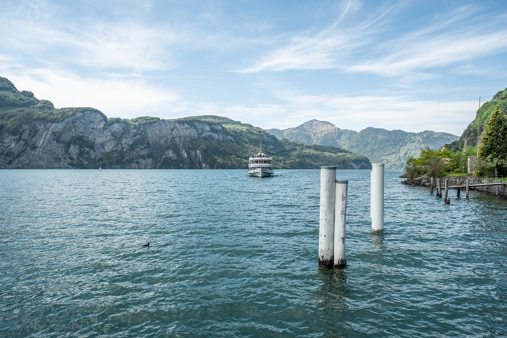 Vessel cruising on Lake Lucerne with the mountains of Central Switzerland in the background