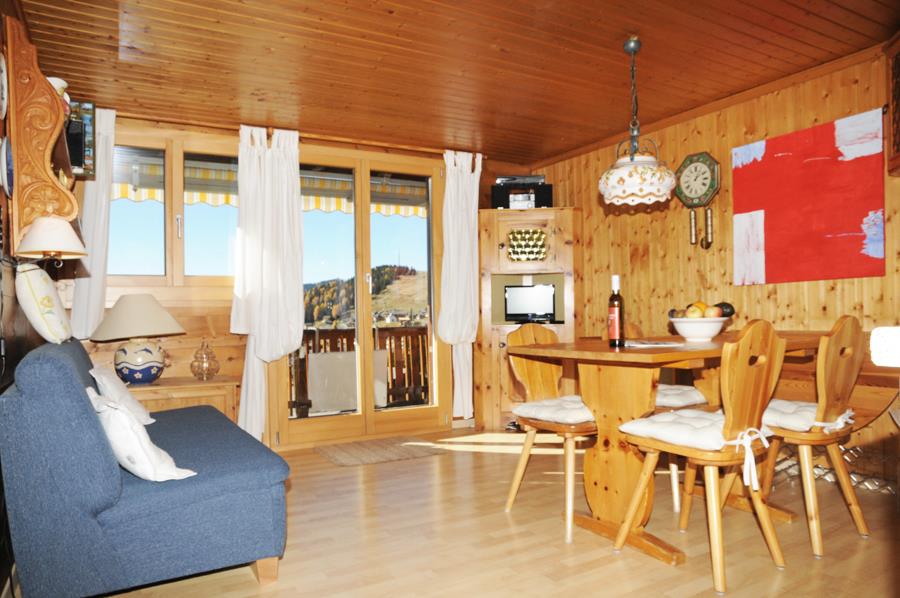 Trollius 1. Stock Ost - Ferienchalet Trollius 1. Stk. Ost - Wohnzimmer