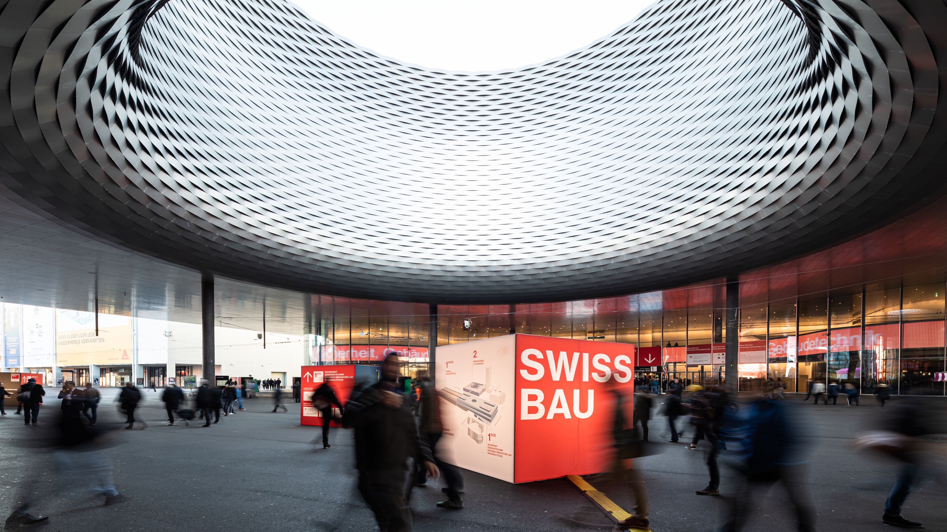 Visitors experience innovative solutions and trends in construction, architecture, and energy at Swissbau 2026 in Basel.