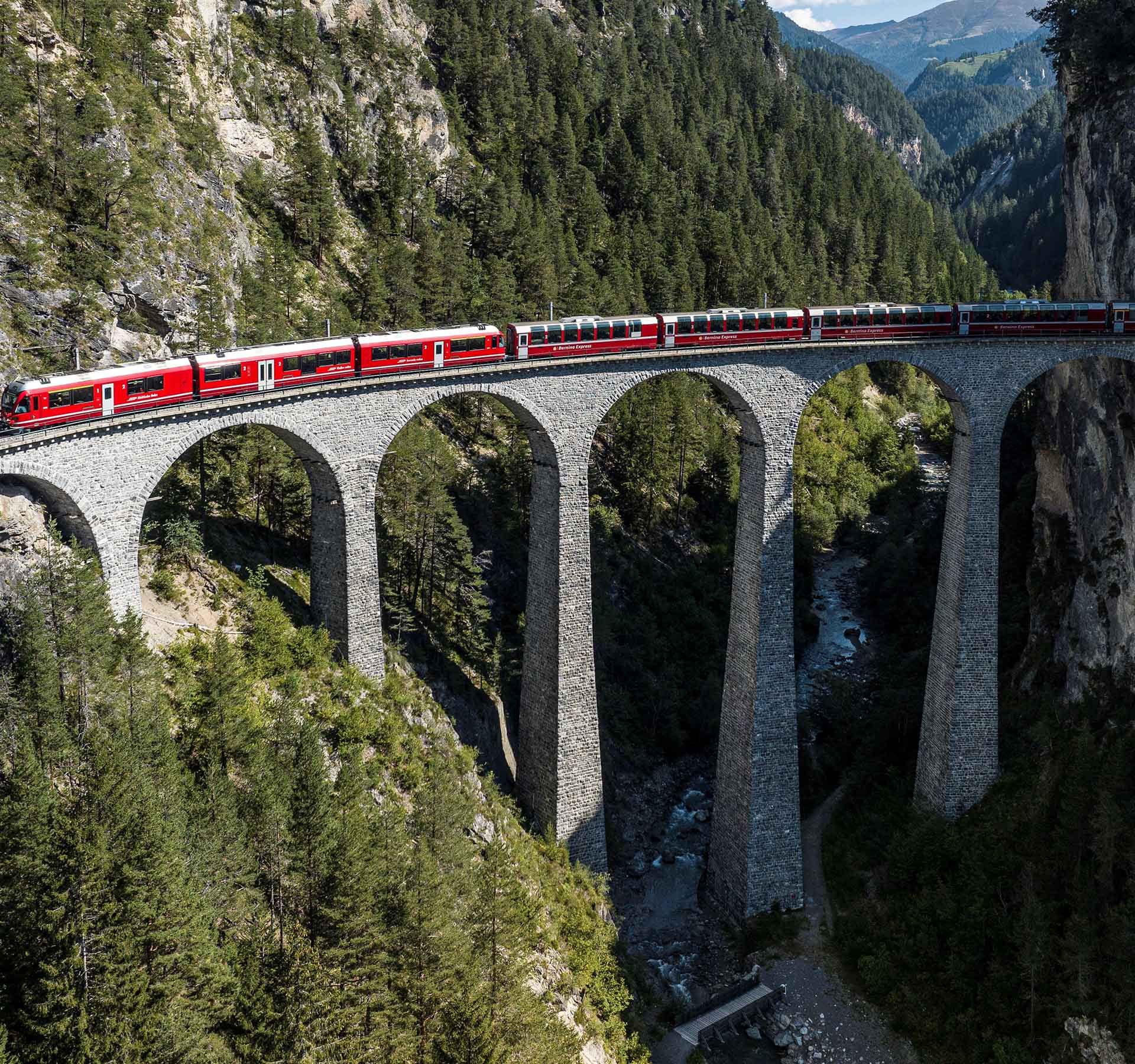 The Bernina Express of the Rhaetian Railway crosses the Landwasser Viaduct.