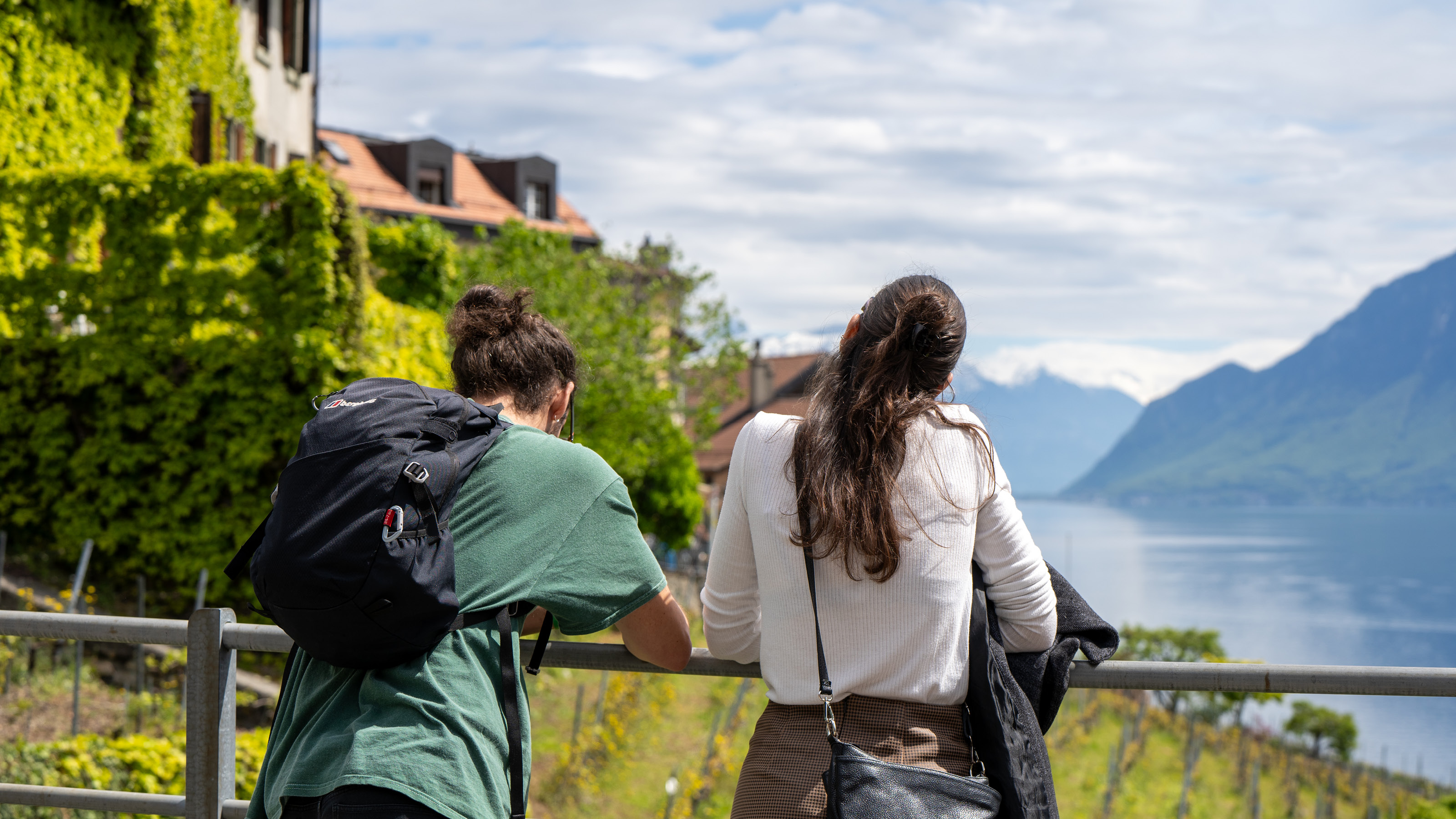 Two people in Epesses look forward to the wine festival among the vineyards.