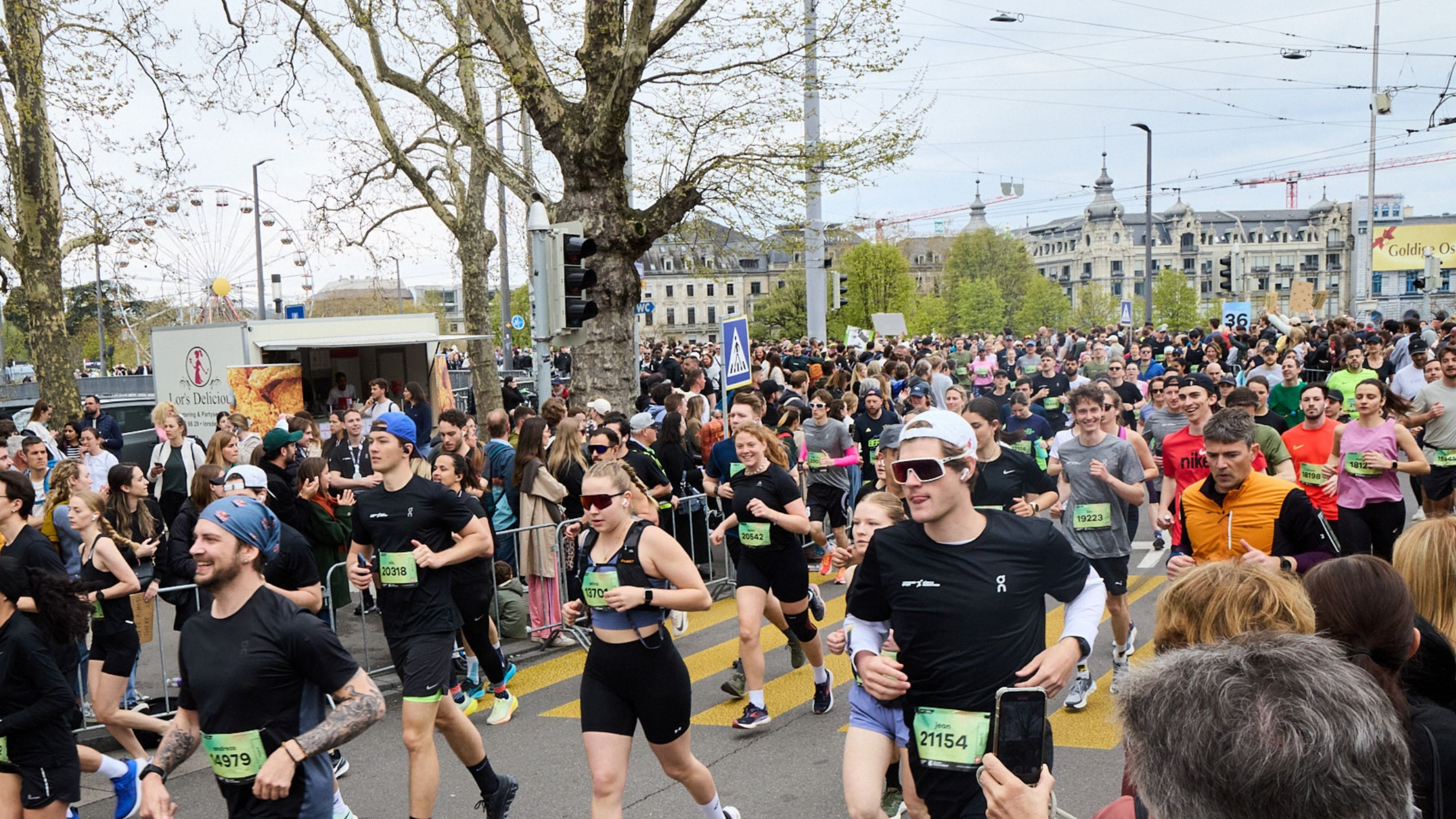 Zurich Marathon: runners passing through the city and along Lake Zurich.