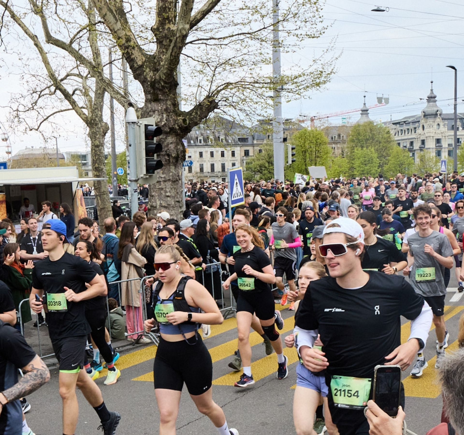 Zurich Marathon: runners passing through the city and along Lake Zurich.