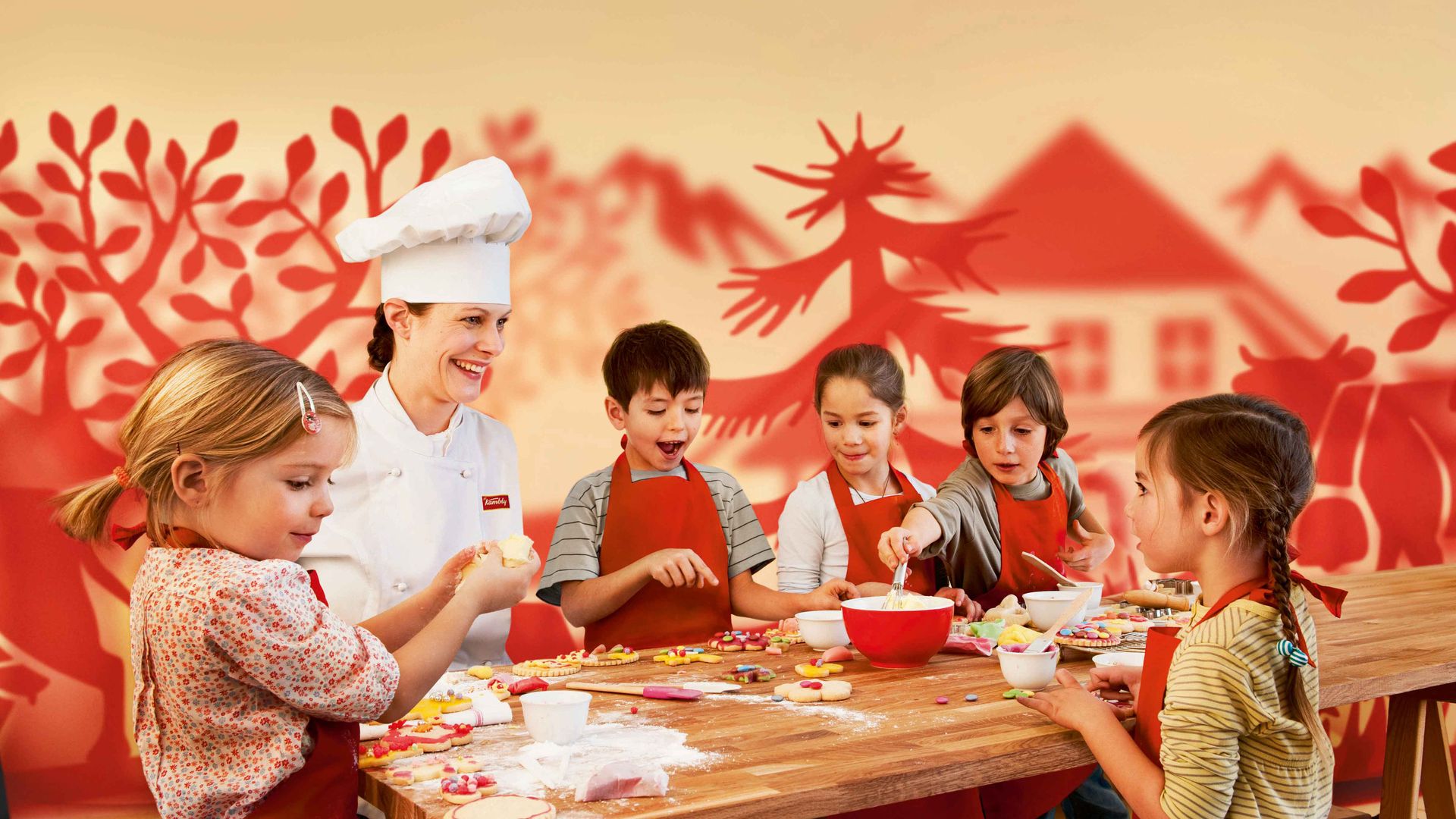 A group of children joyfully cooking together in a bright, cheerful kitchen filled with various utensils and ingredients.