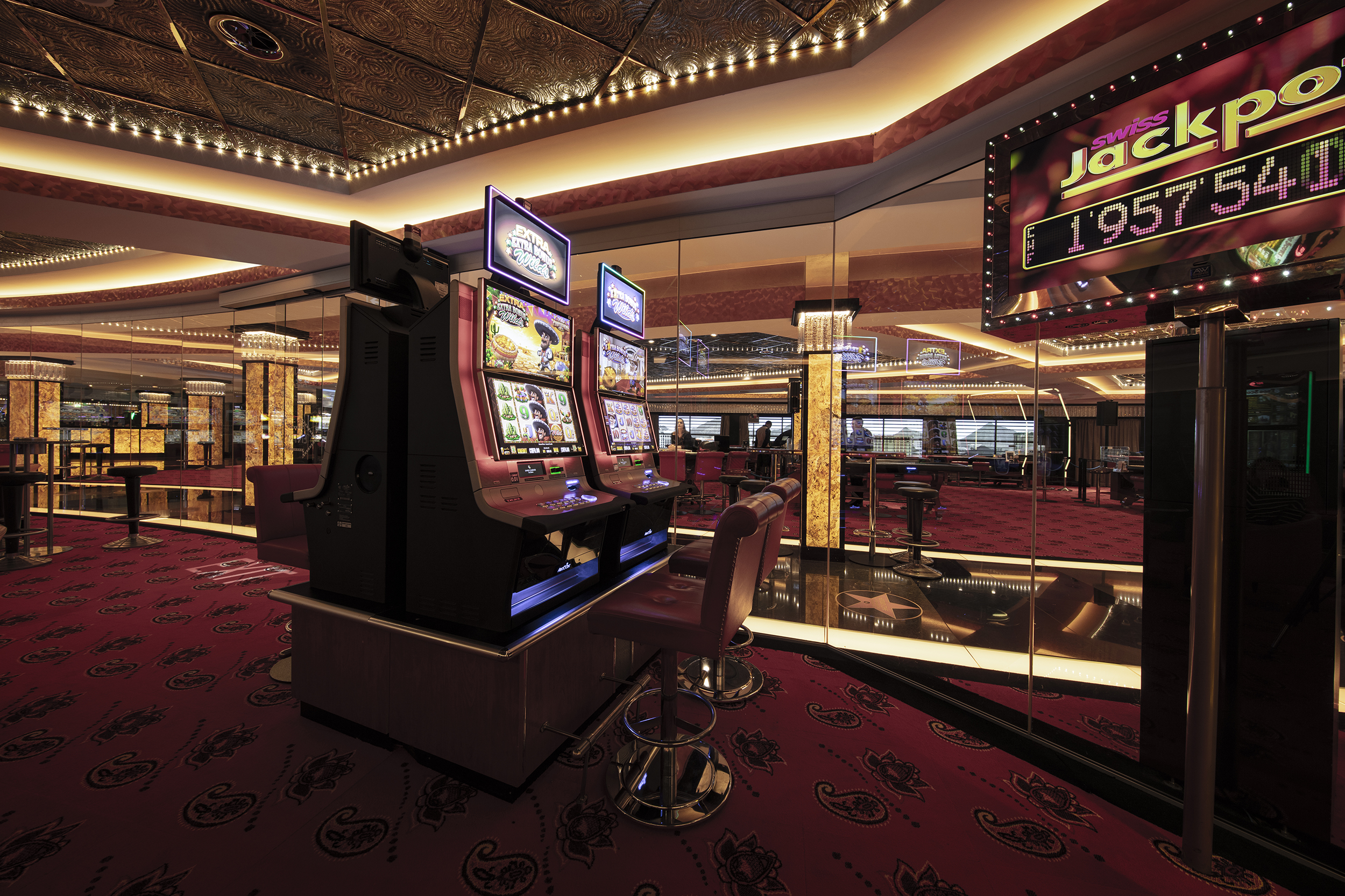 Casinò di San Gallo con slot machine moderne, atmosfera elegante e Swiss Jackpot nella sala da gioco