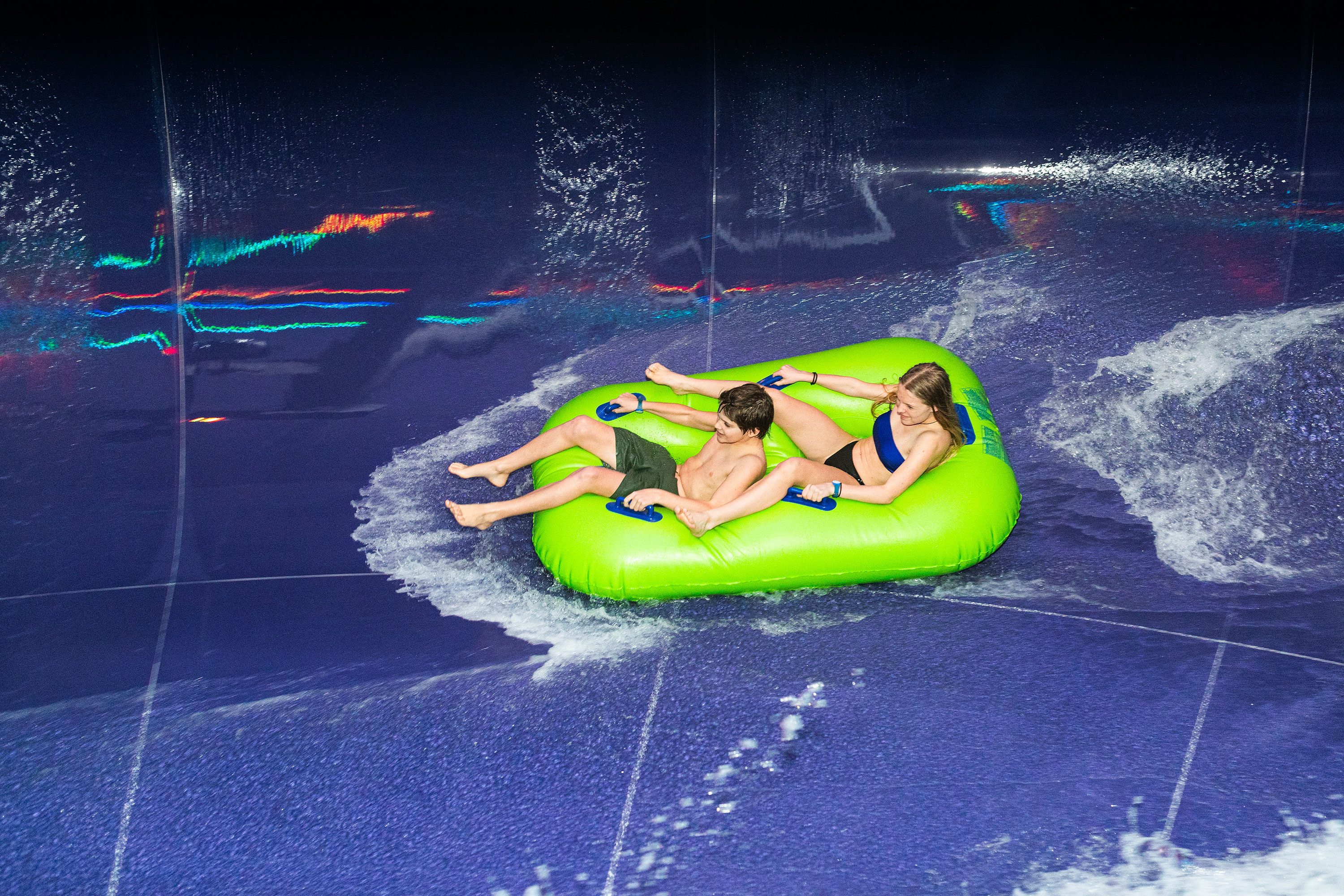 Guys on the water slide