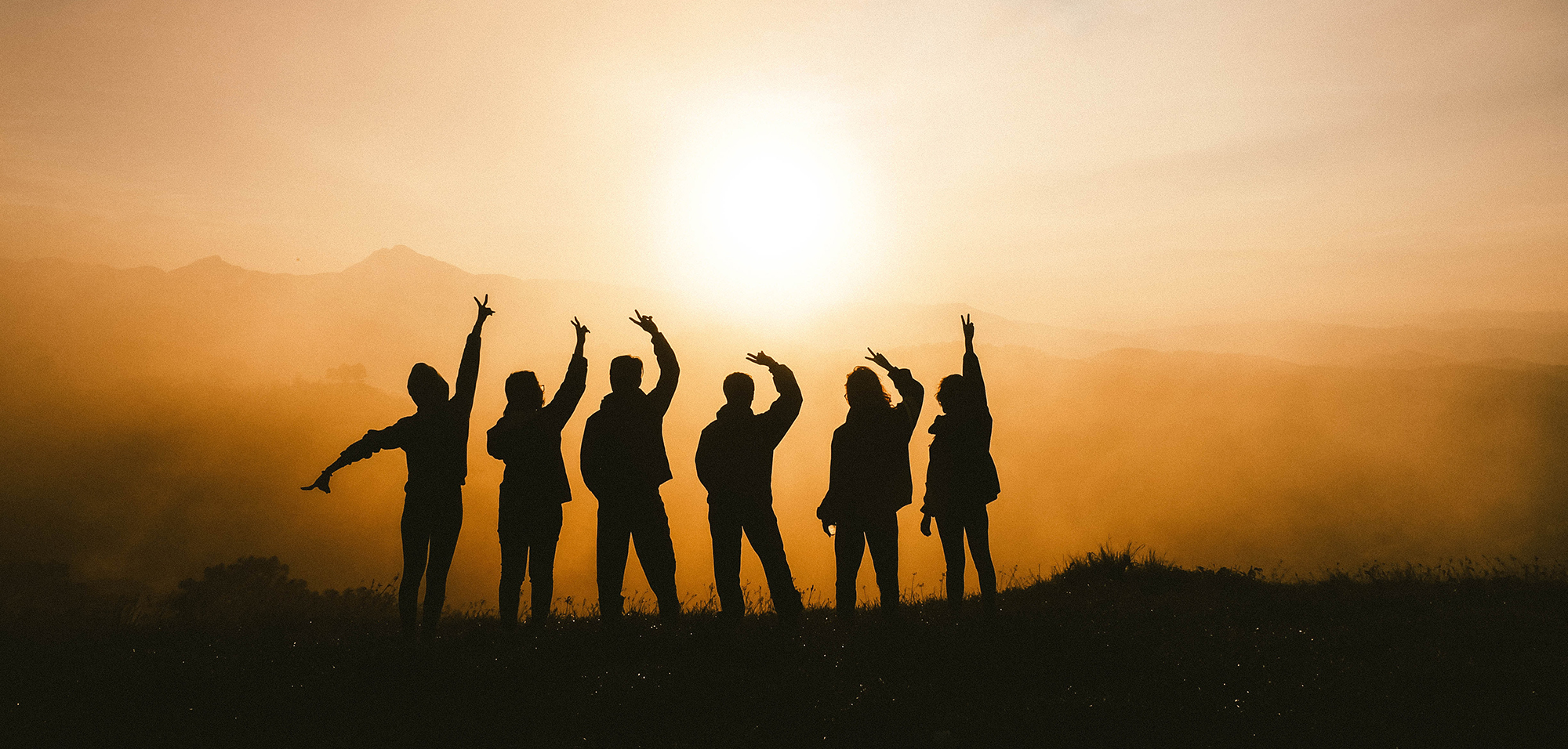Gruppe beim Sonnenuntergang