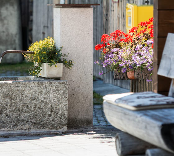 Brunnen im Dorf Disla in Disentis/Mustér