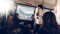 NostalChic Class interior view, guests, sunshine, view of the Matterhorn