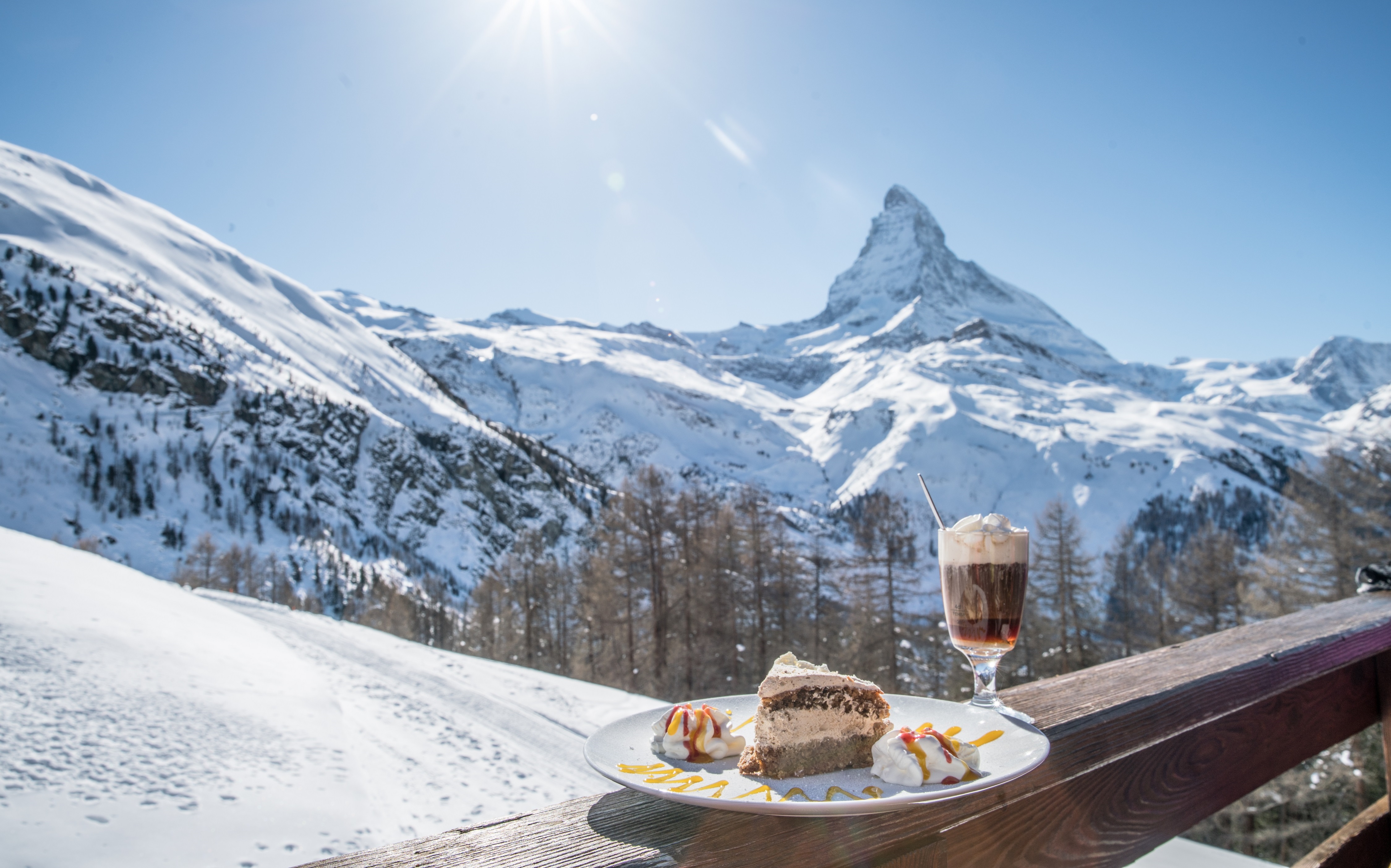 Dessert on the sun terrace at Restaurant Alphitta in front of the Matterhorn on Riffelalp. Part of the Gourmet Ticket