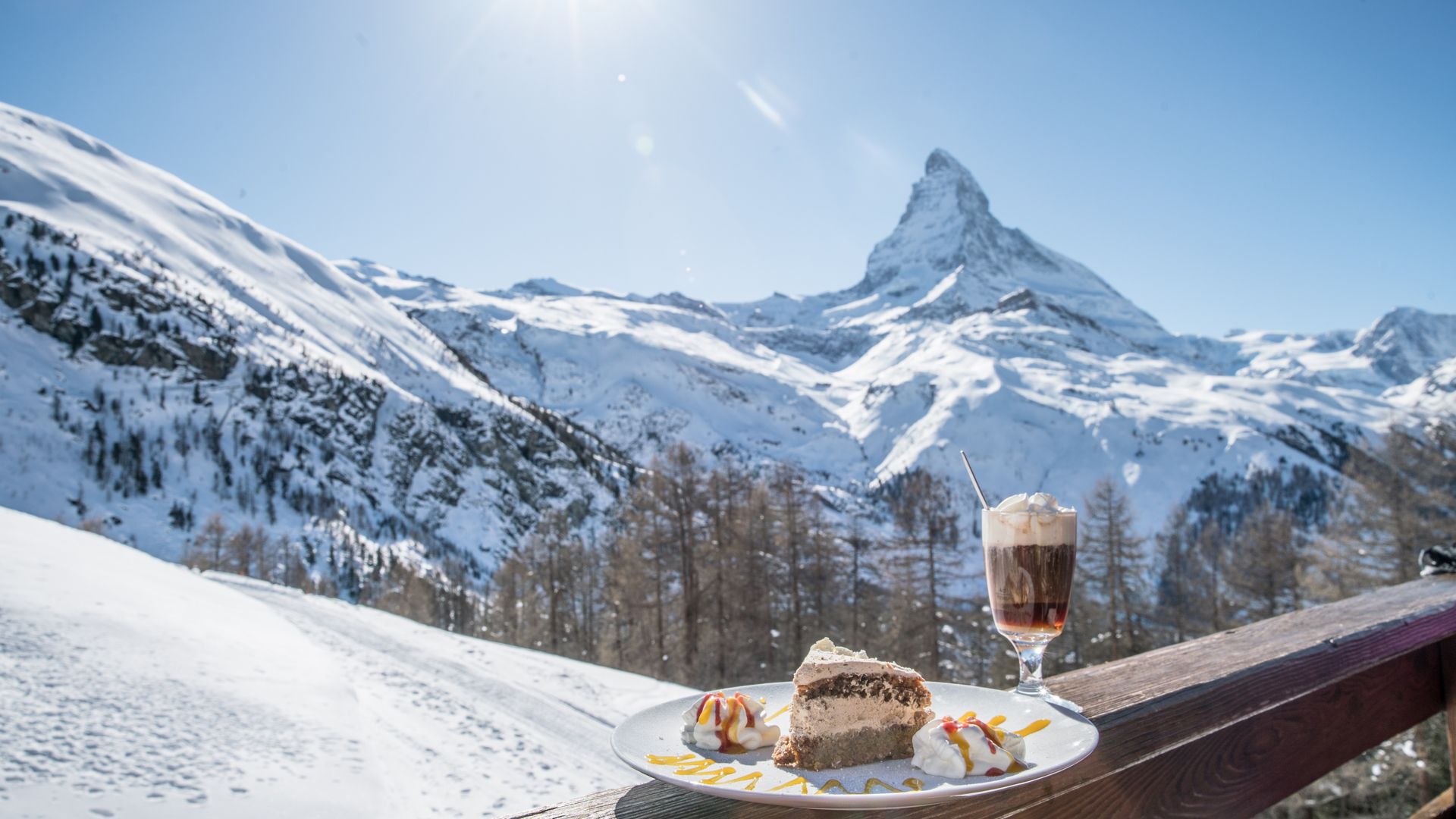 Dessert on the sun terrace at Restaurant Alphitta in front of the Matterhorn on Riffelalp. Part of the Gourmet Ticket