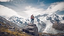 Couple on the Gornergrat with view to the Gorner glacier