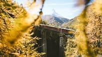 Gornergrat railway on the Findelbach bridge above Zermatt in autumn